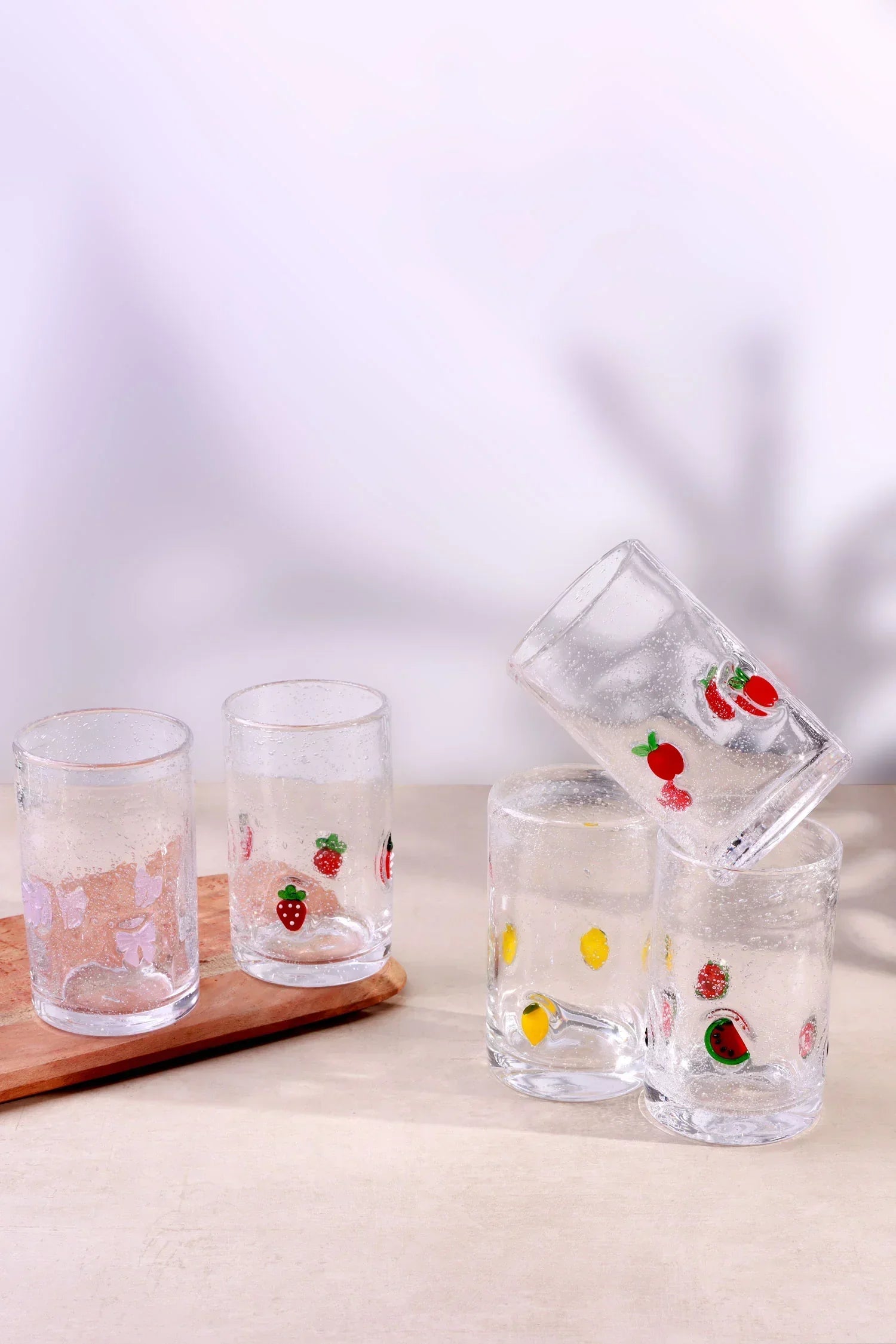 Choosing glassware for the home — Berry and Bow handmade bubble glass tumblers with textured fruit and ribbon detail | G Decor