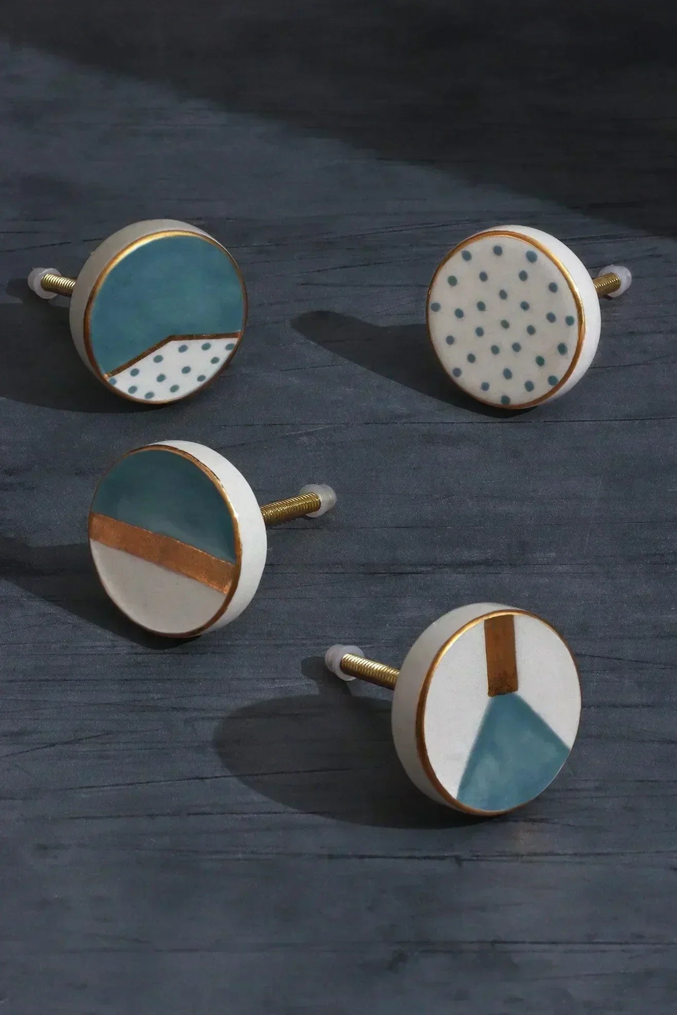 How many knobs a kitchen needs - geometric and polka dot hand-painted ceramic cabinet knobs, counted out for a full room | G Decor