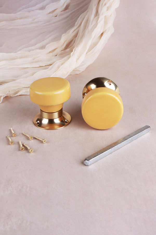 Yellow Ceramic Mortice Door Knobs with Polished Brass Roses