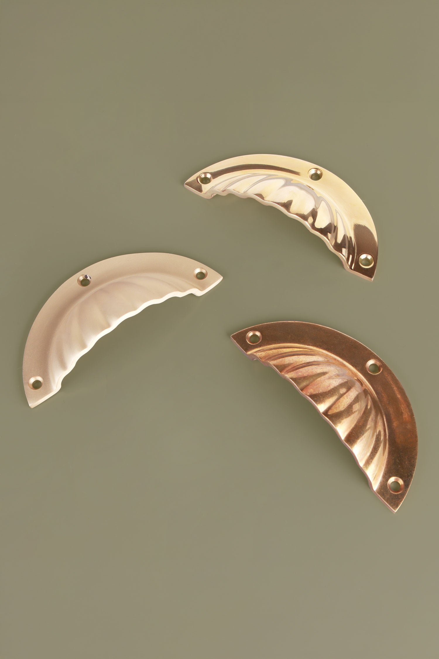 Fluted cup pulls on a drawer front