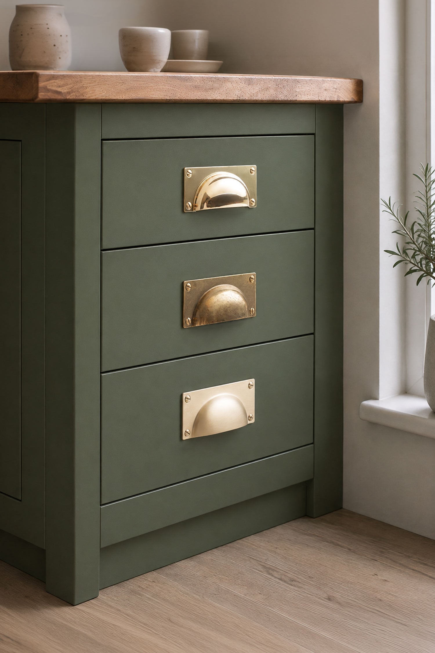 Bevelled Plate solid brass cup pull, shown in polished, aged and satin brass