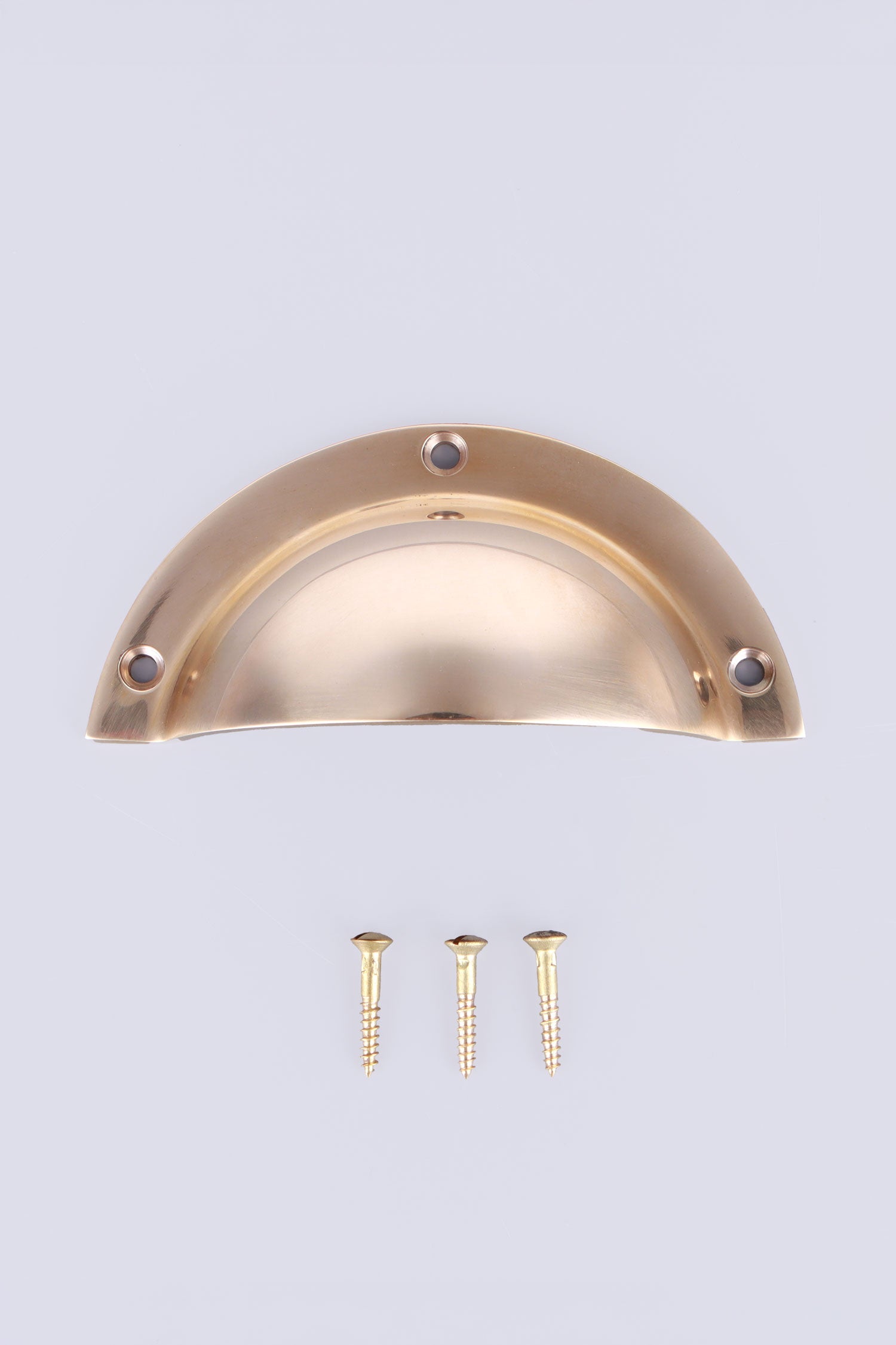 Stepped Rim cup pull in polished brass, unlacquered living finish