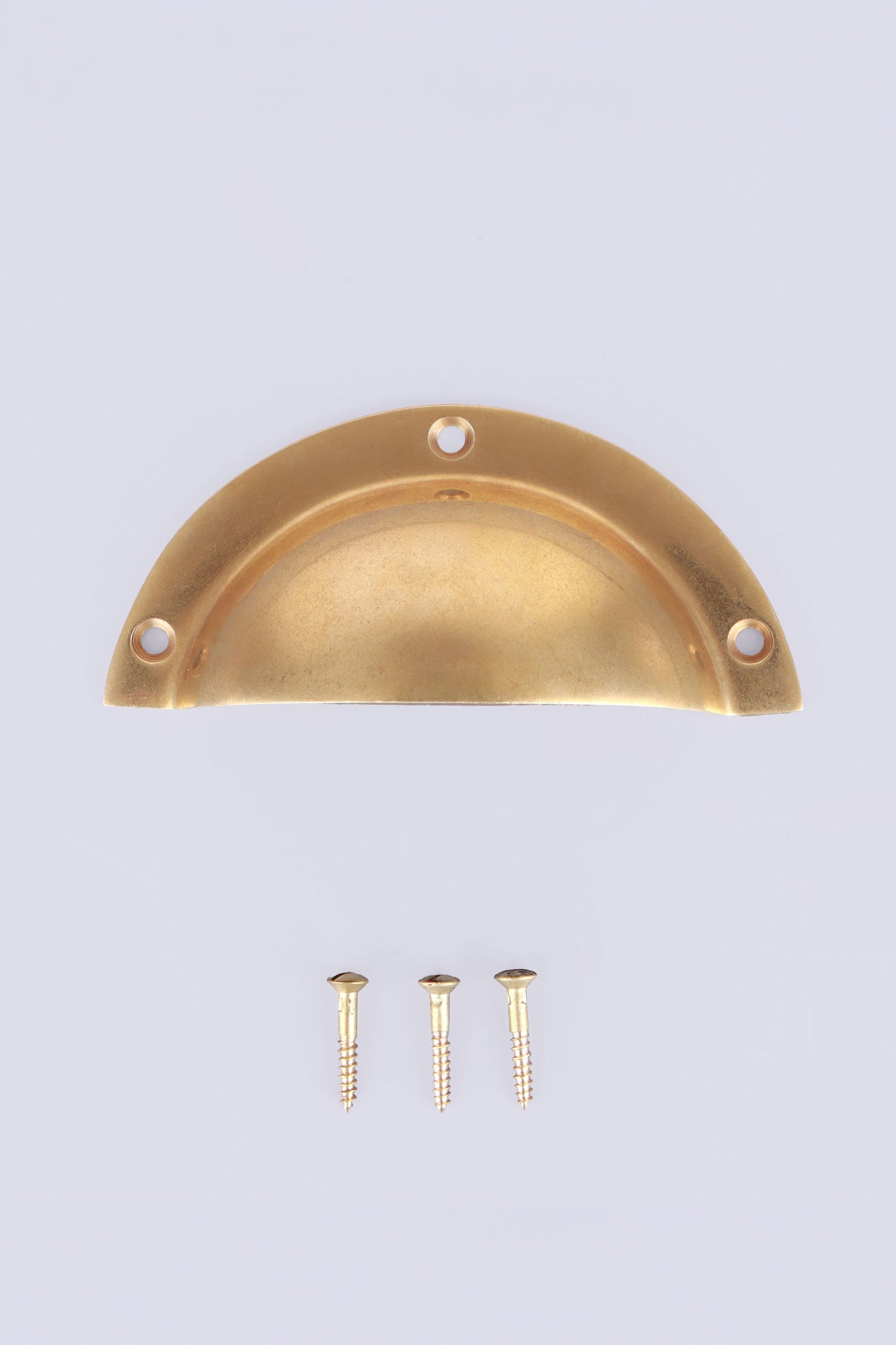 Stepped Rim cup pull in aged brass, unlacquered living finish