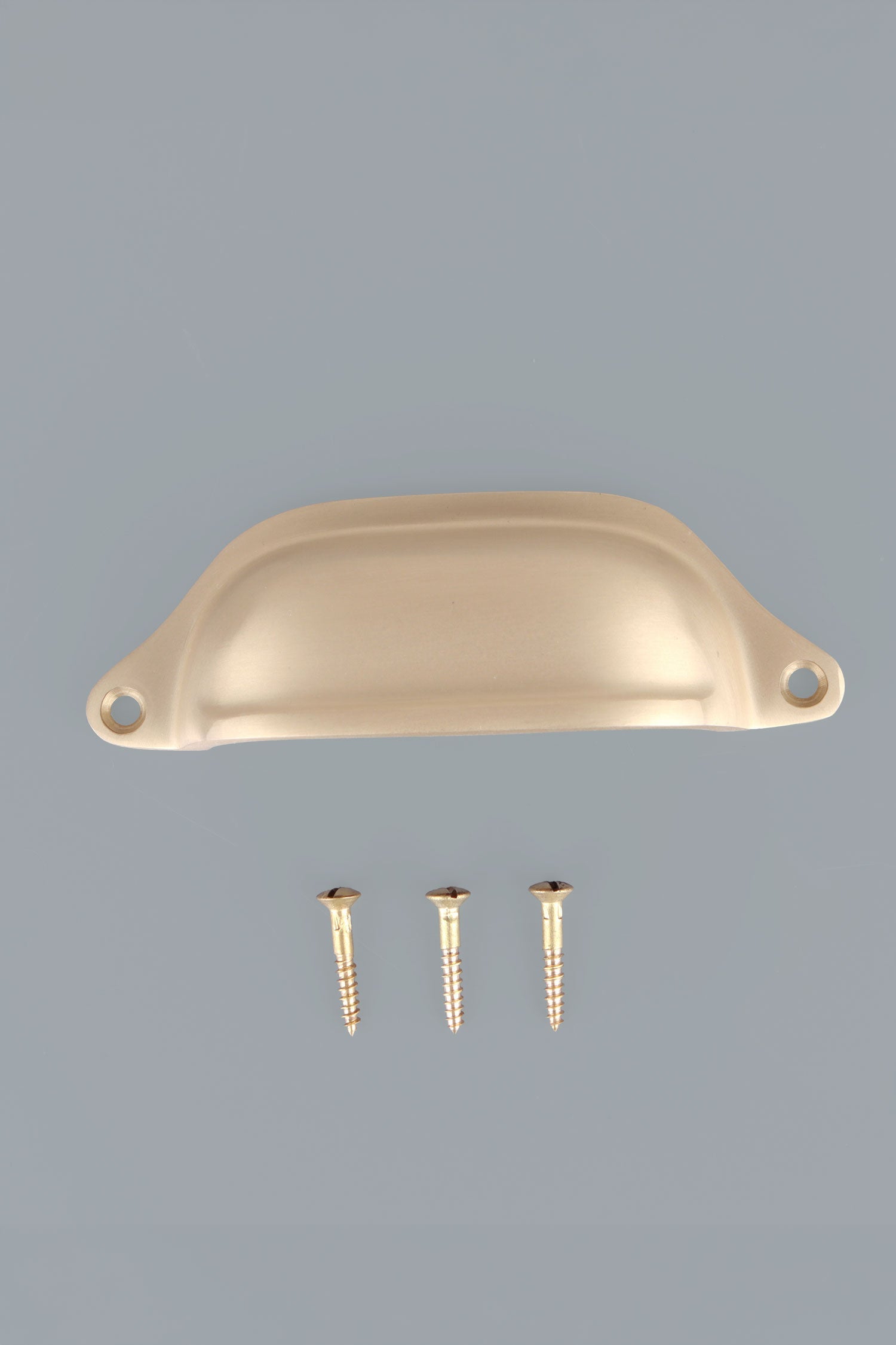 Deep Scoop cup pull in satin brass, lacquered finish