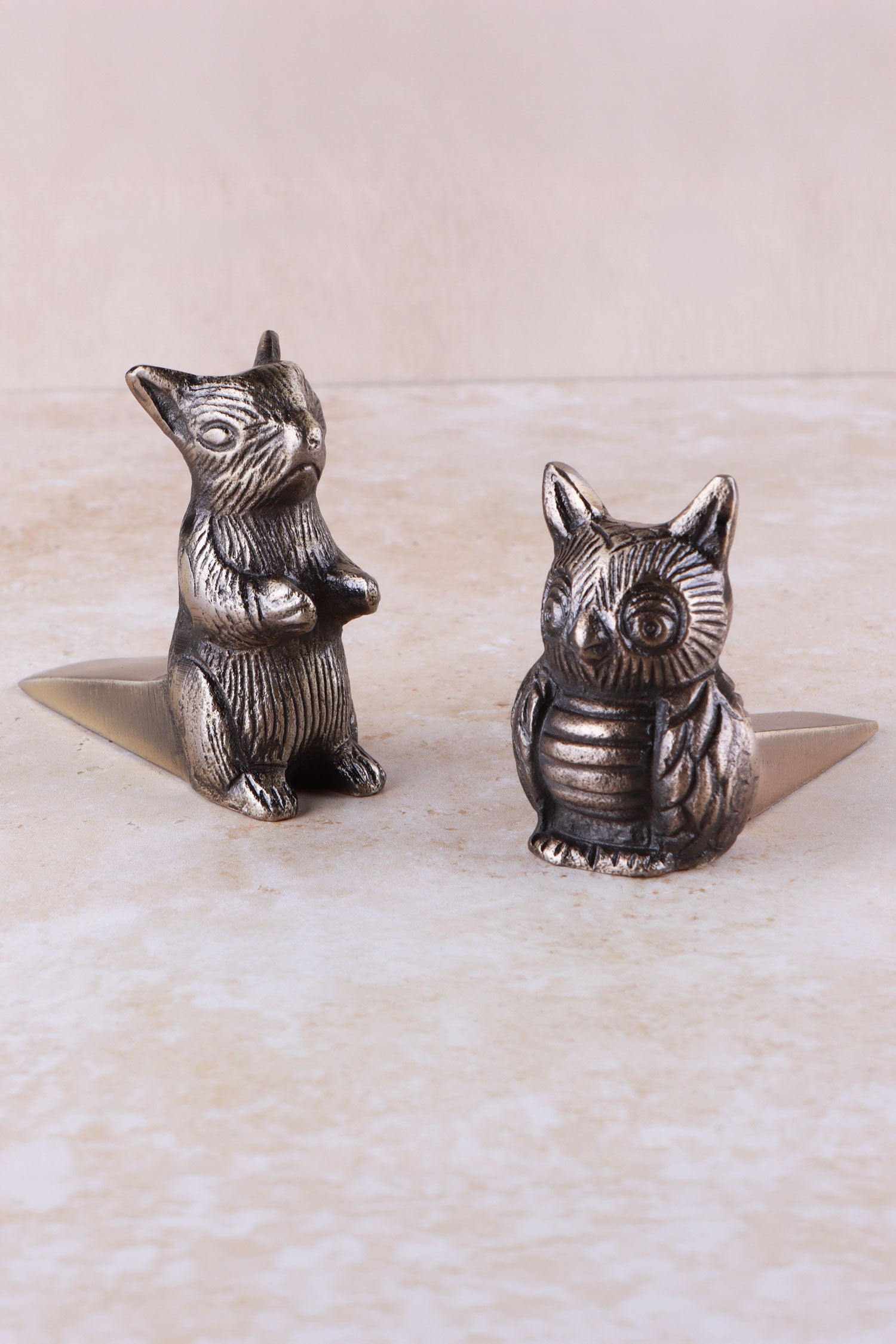 Owl and squirrel door stoppers together, antique brass