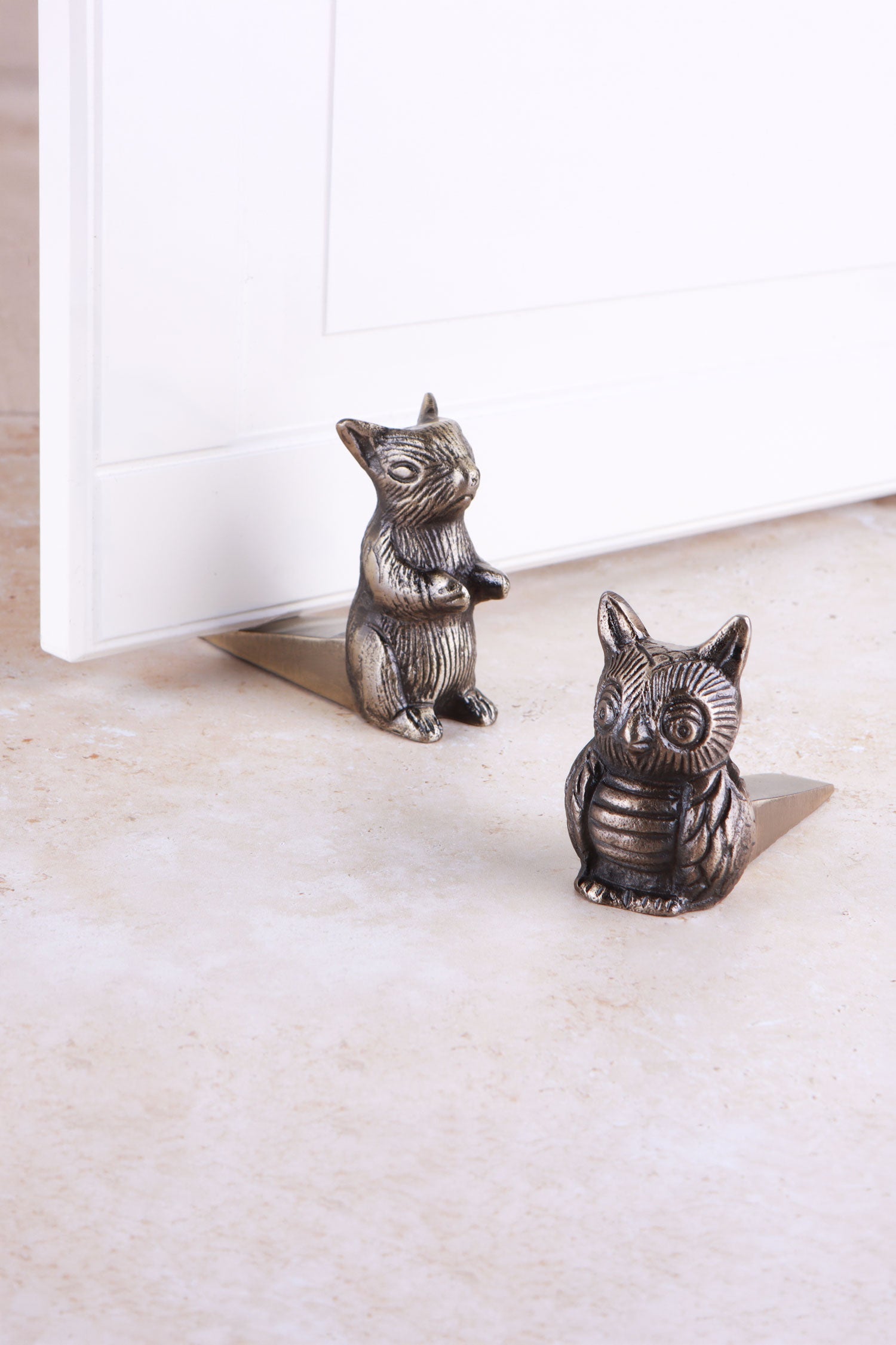 Woodland owl and squirrel door stoppers in antique brass