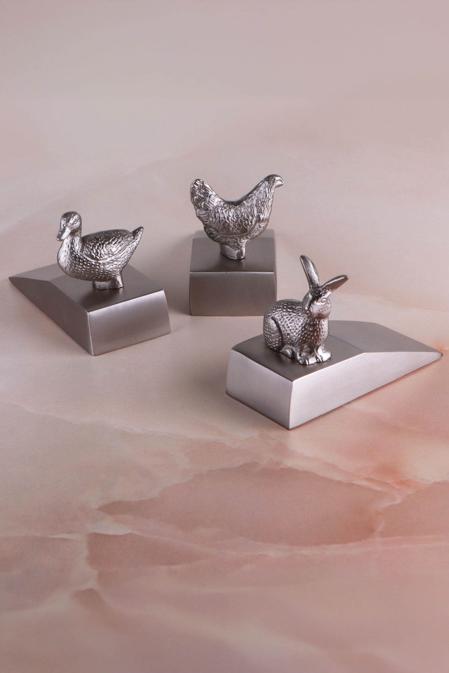 Chrome Homestead door stoppers grouped together