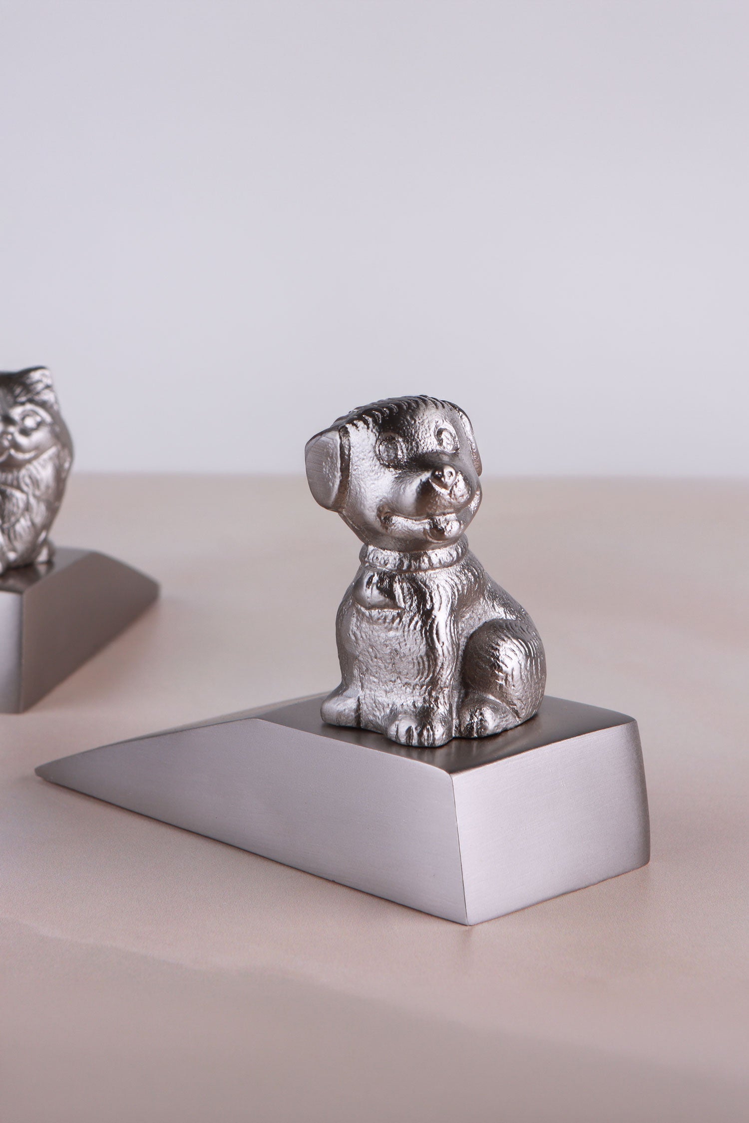 Dog door stopper in chrome