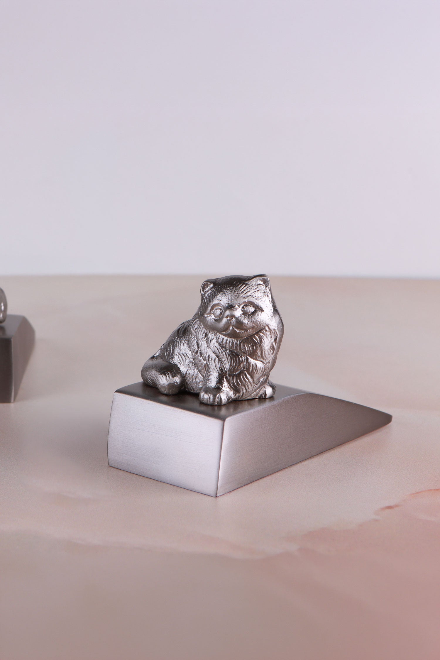 Cat door stopper in chrome