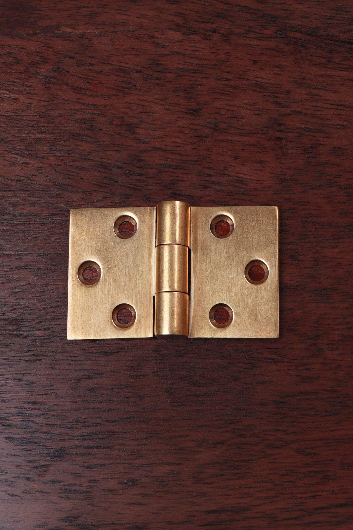 Aged brass backflap hinge with wide solid brass leaves