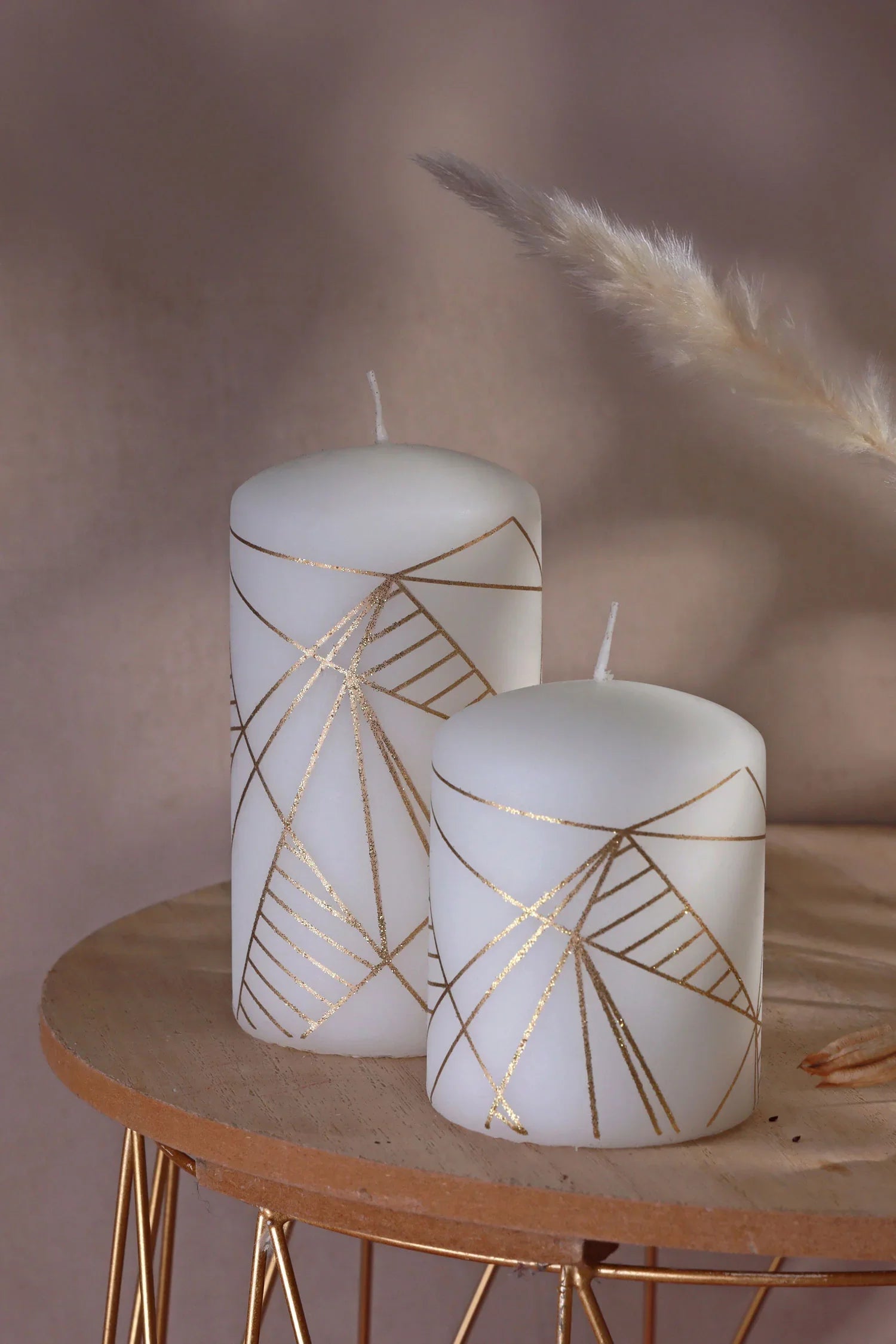 Luxury white pillar candles with gold geometric lines on a modern wooden table, G Decor home décor