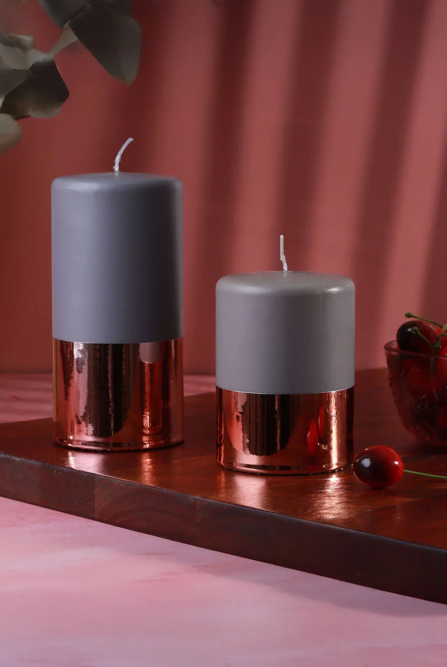 Luxury G Decor grey and rose gold candles on a wooden tray, elegant home décor