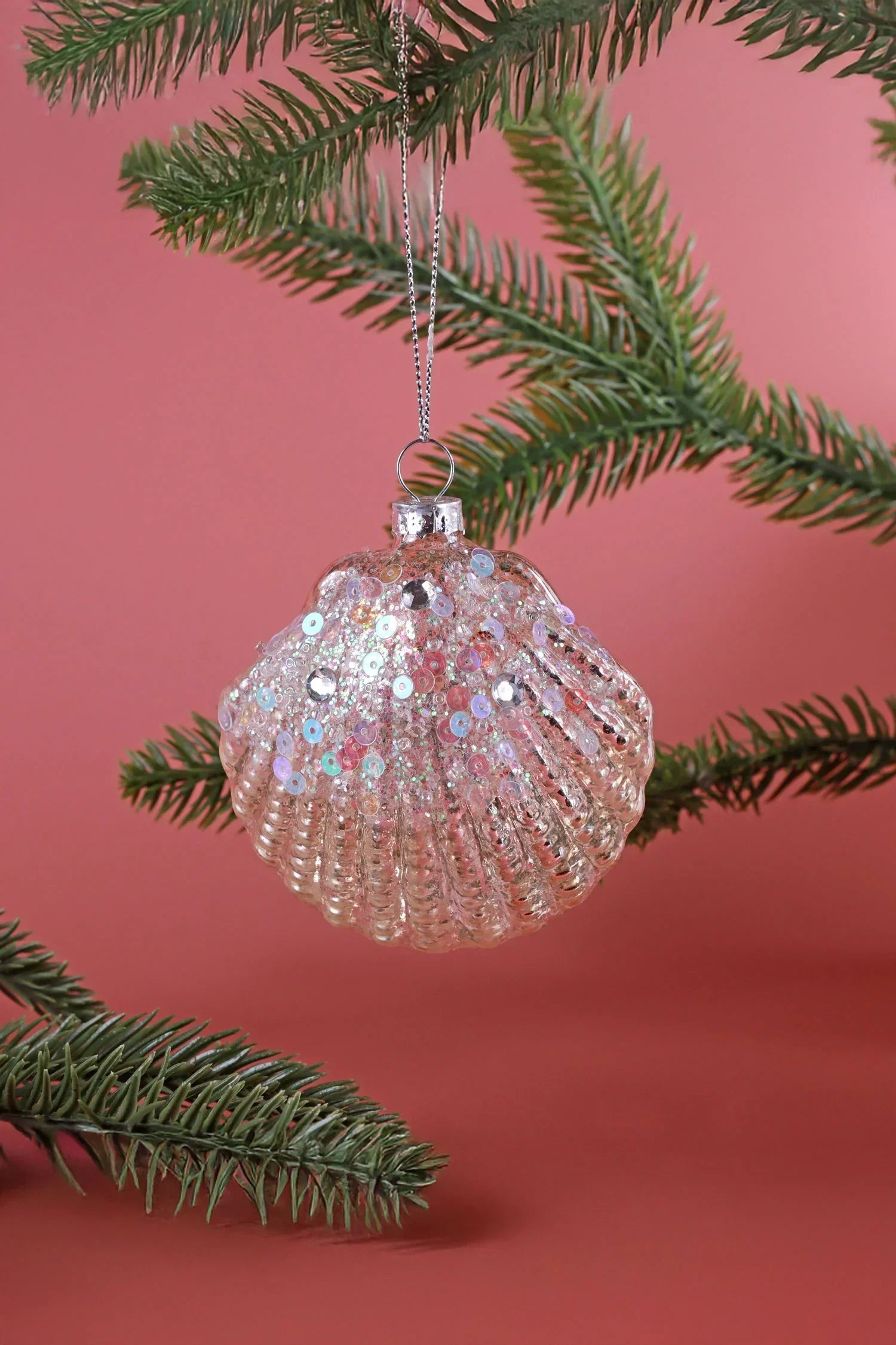 Sequin shell glass ornament hanging on pine branch, luxury G Decor Christmas decoration