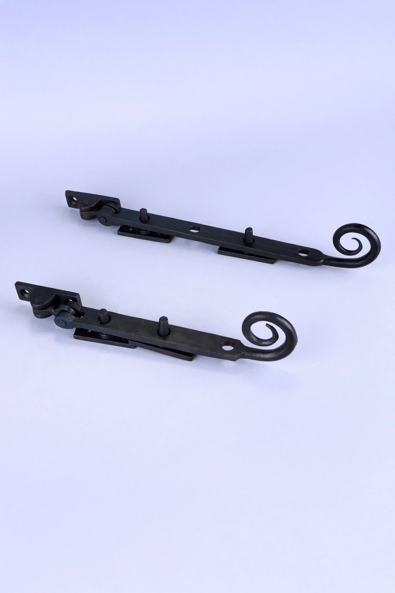 Hand-Forged Monkey Tail Window Stay, Beeswax — close-up view, G Decor