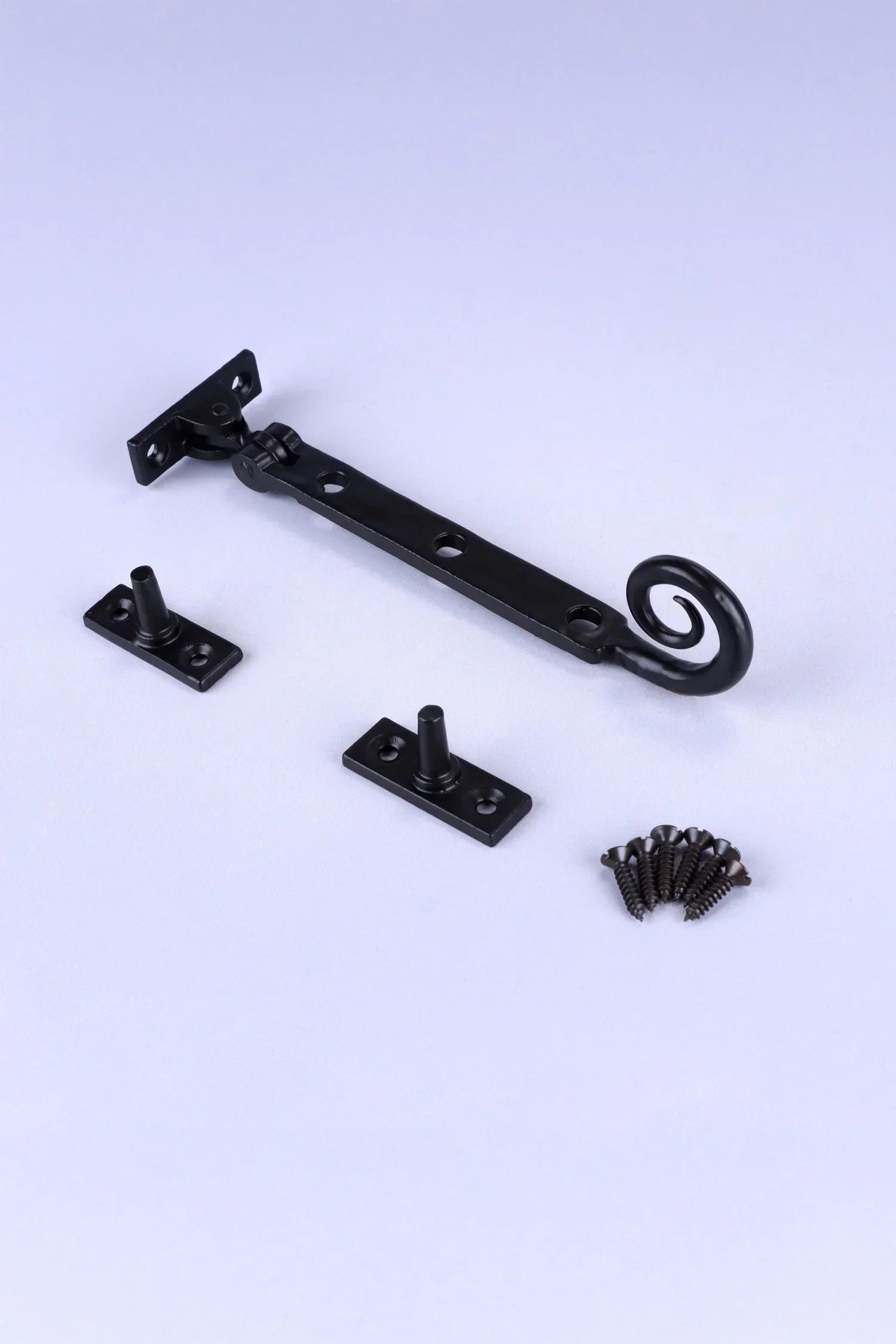 Hand-Forged Monkey Tail Window Stay, Black — lifestyle view, G Decor