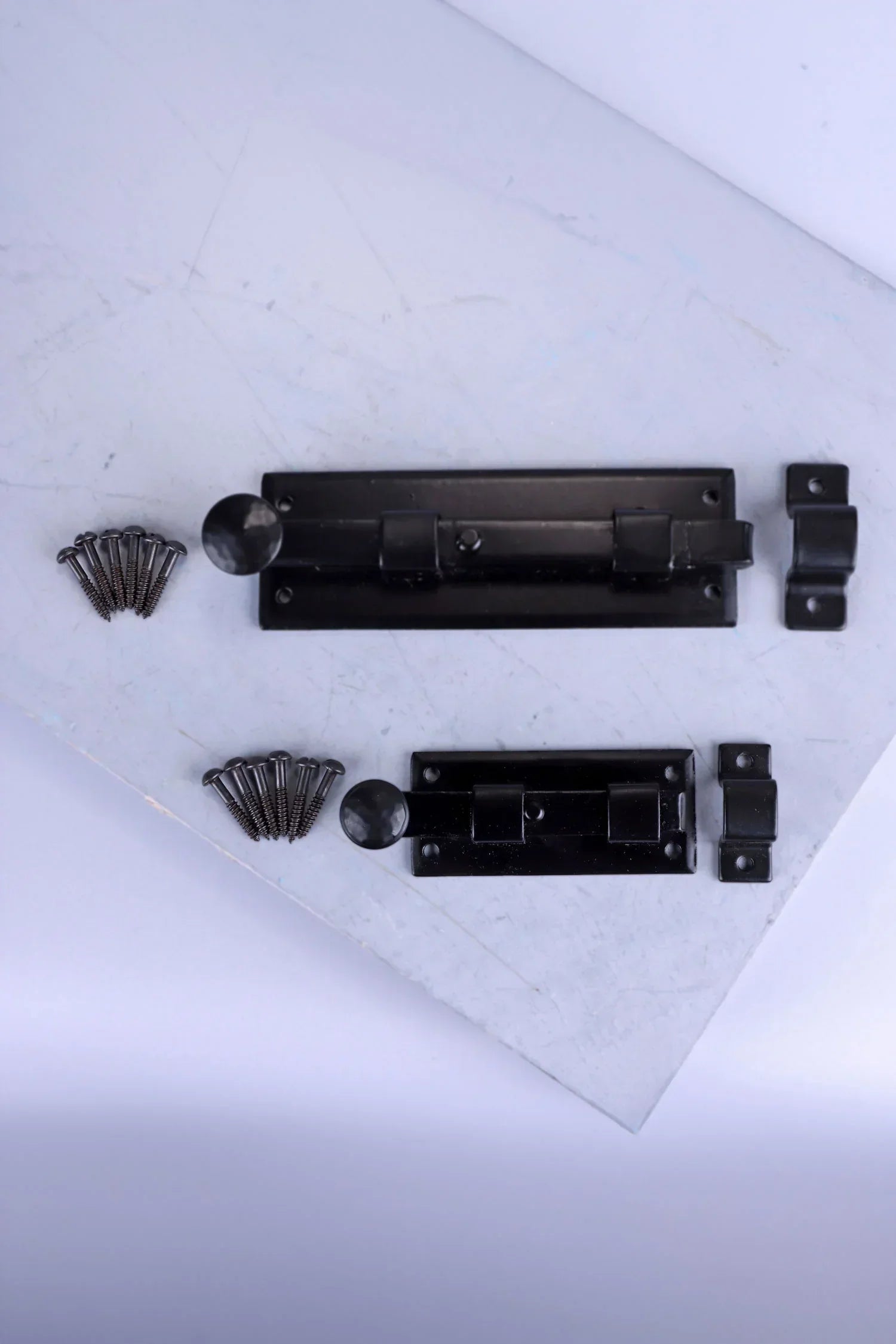 Hand-Forged Hammered Iron Sliding Door Bolt, Black — close-up view, G Decor