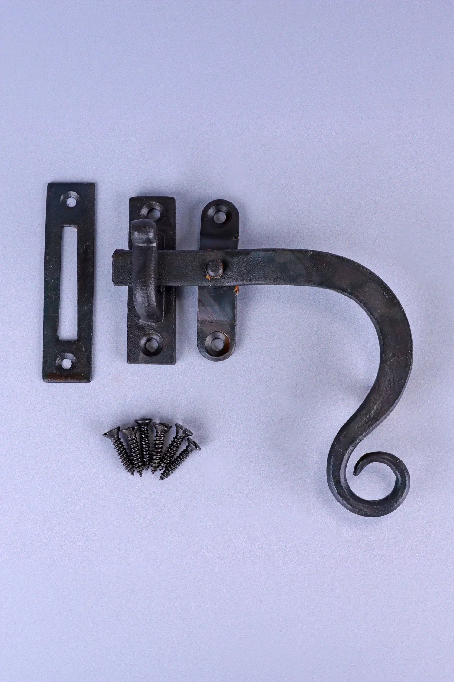 Hand-Forged Monkey Tail Window Fastener, Beeswax — lifestyle view, G Decor