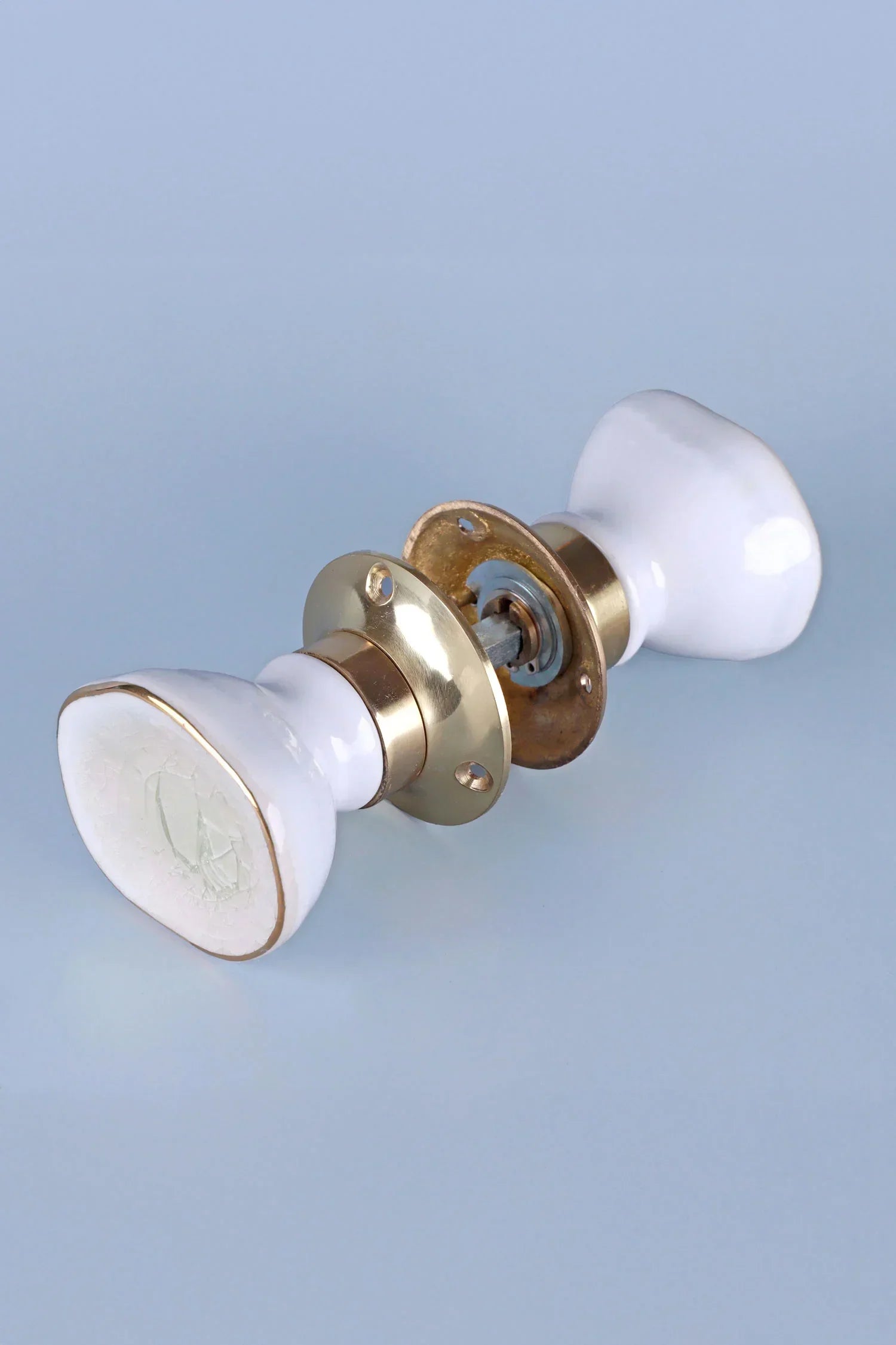 Rhodes Cream Crackle Glaze Ceramic Mortice Door Knobs with Brass Base — lifestyle view, G Decor