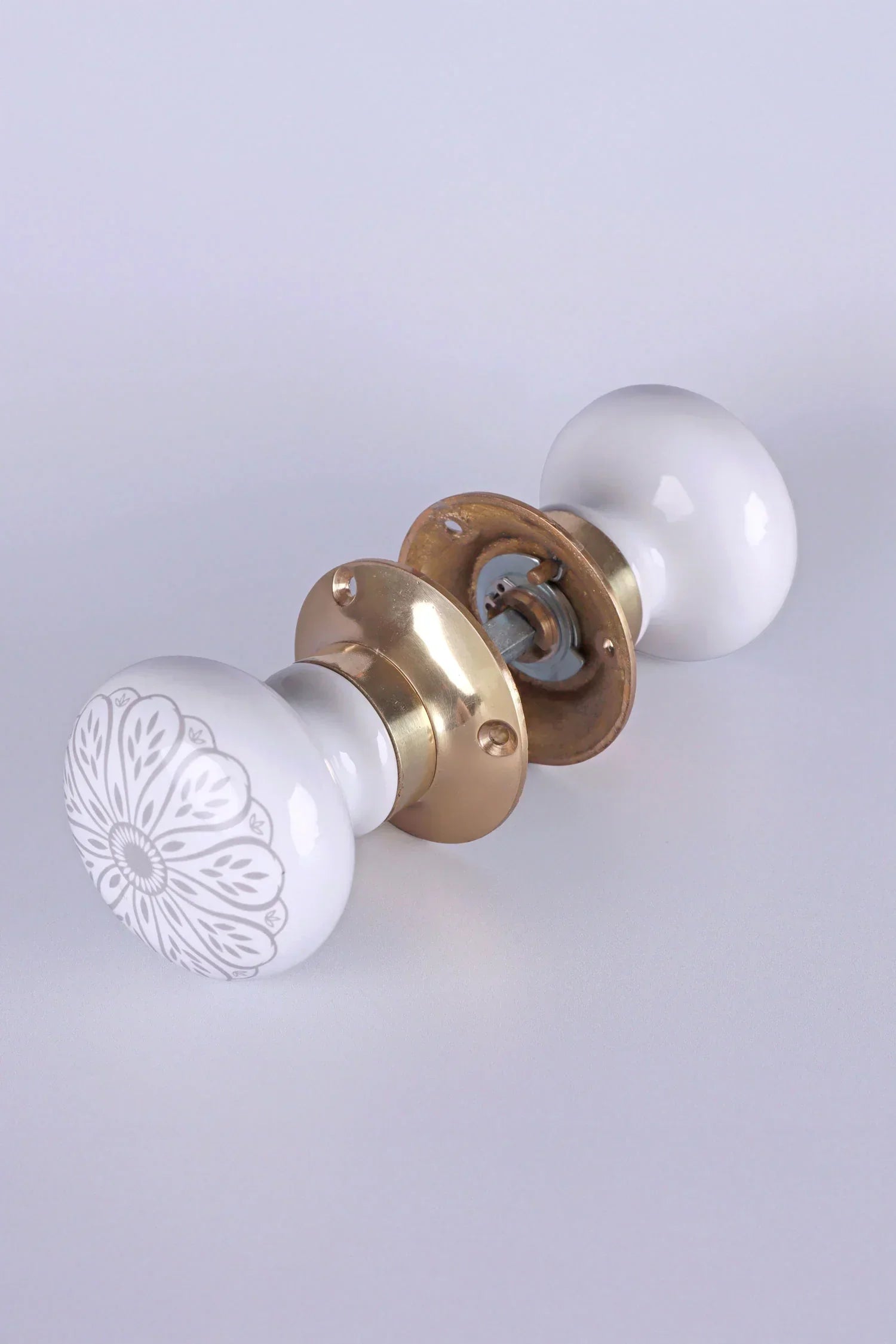 Success Porcelain Mortice Door Knobs with Brass Base — close-up view, G Decor