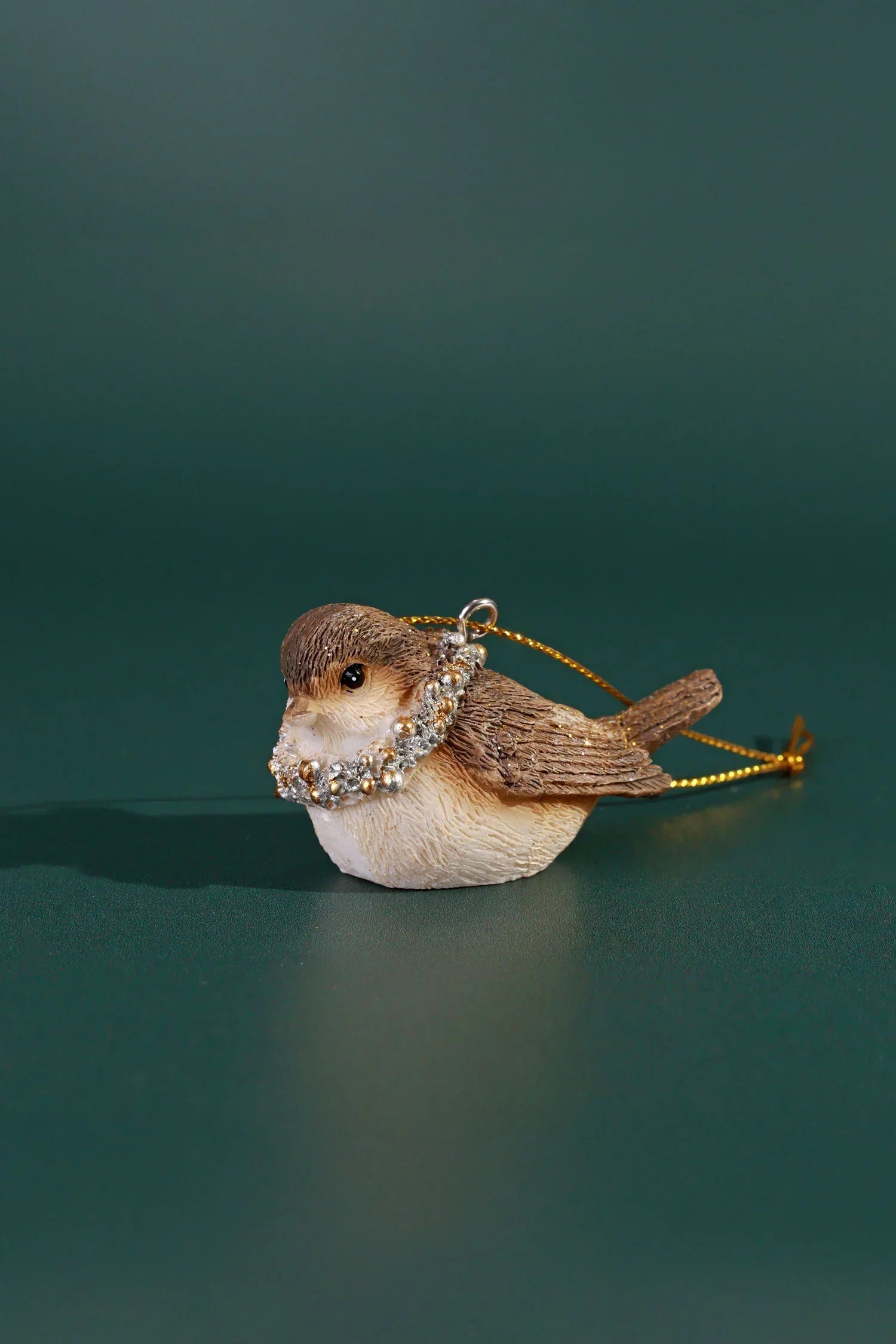 Luxury bird ornament with jeweled wreath necklace on green background, G Decor home décor