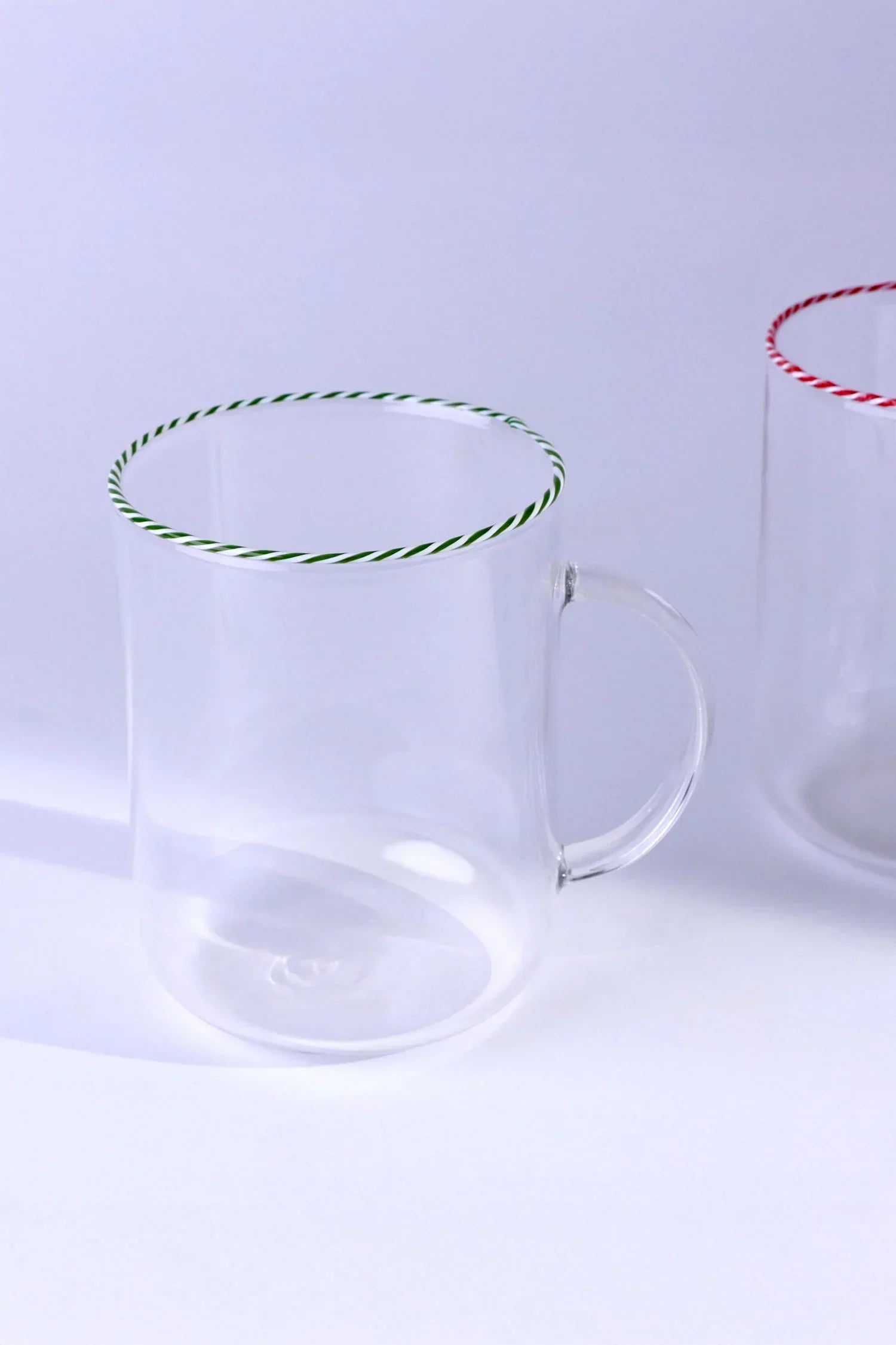 Clear glass mugs with green and red striped rims, luxury tableware by G Decor