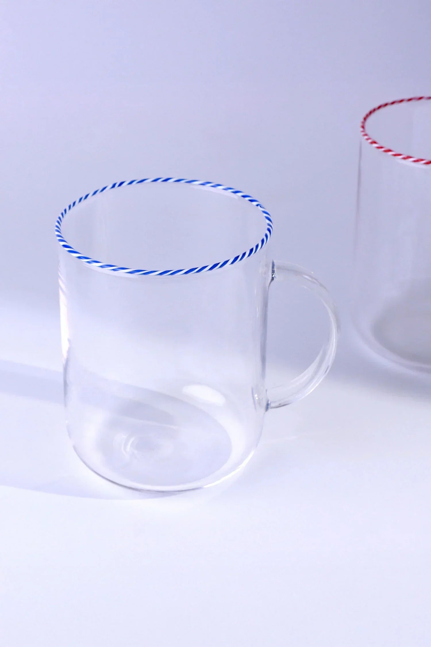Twist Rim Glassware Tea and Coffee Mugs in Red Blue and Green — lifestyle view, G Decor