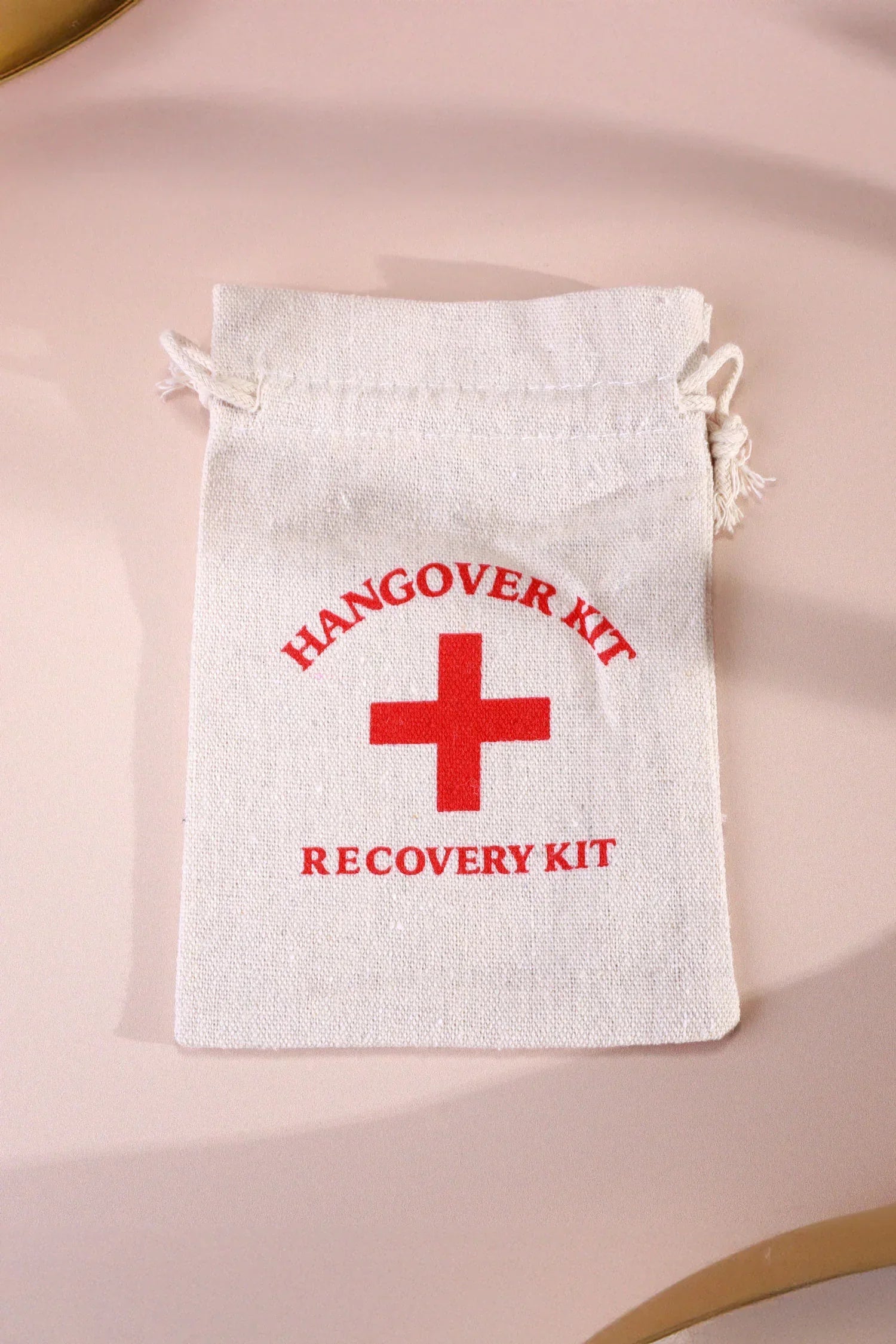 Pair of Hangover Kit Linen Gift Bags with Red Cross Design — view 6, G Decor