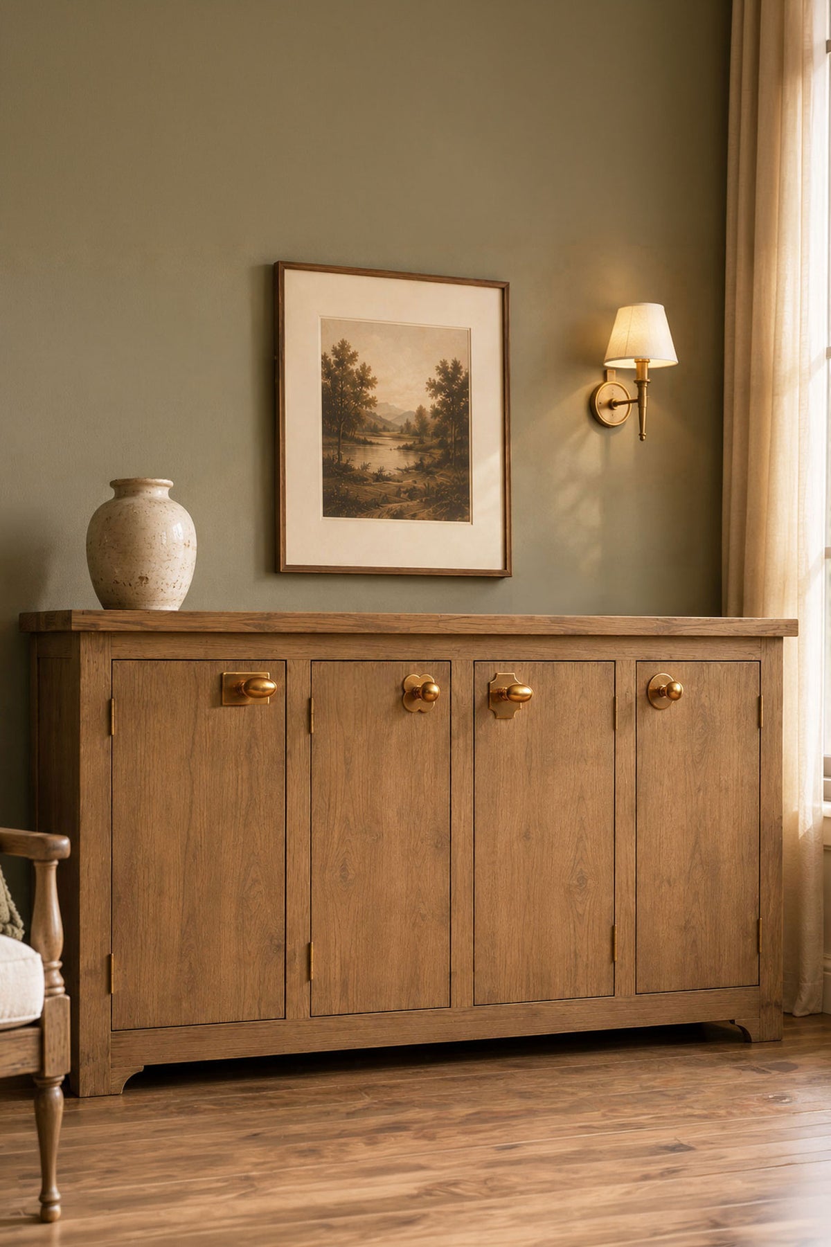 Cabinet knobs and backplates in aged brass, second view