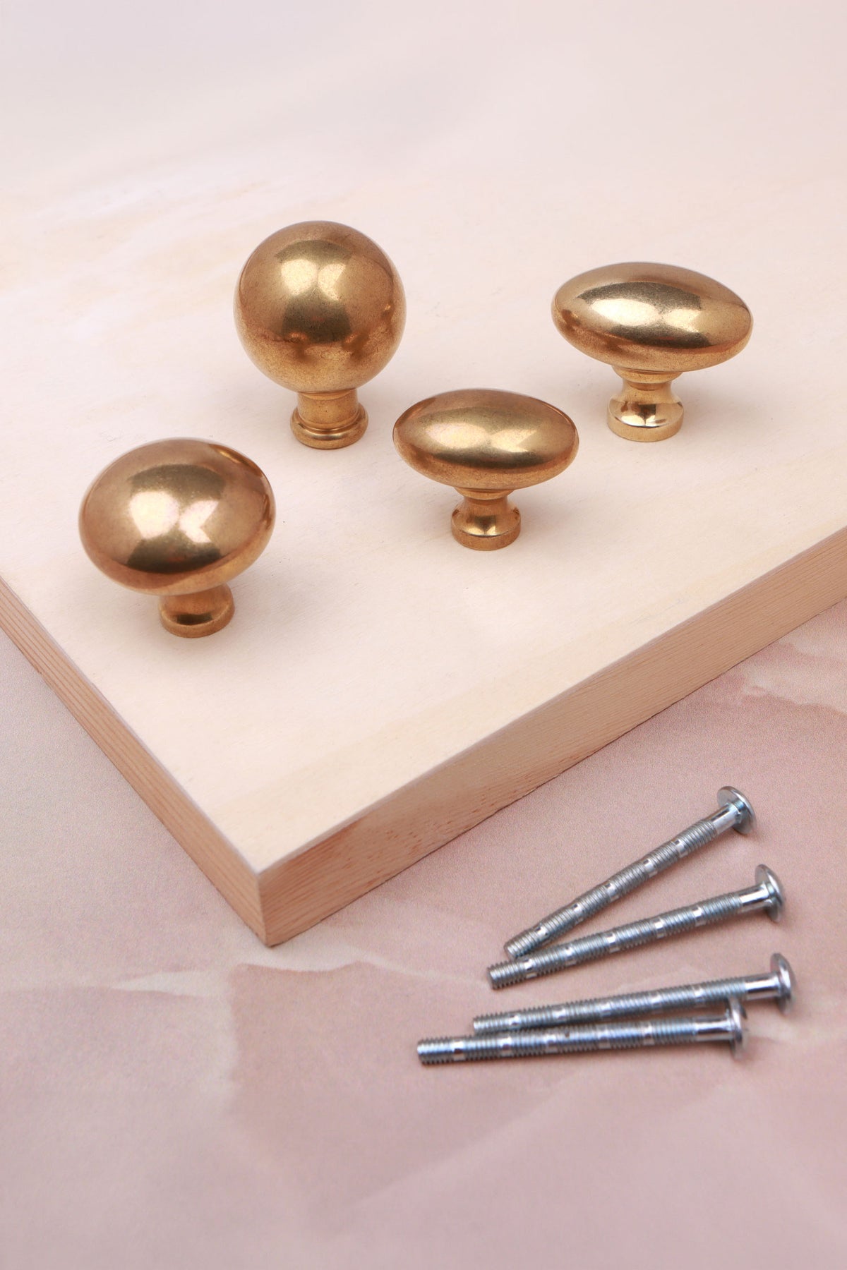 Cabinet knobs and backplates in aged brass, fifth view