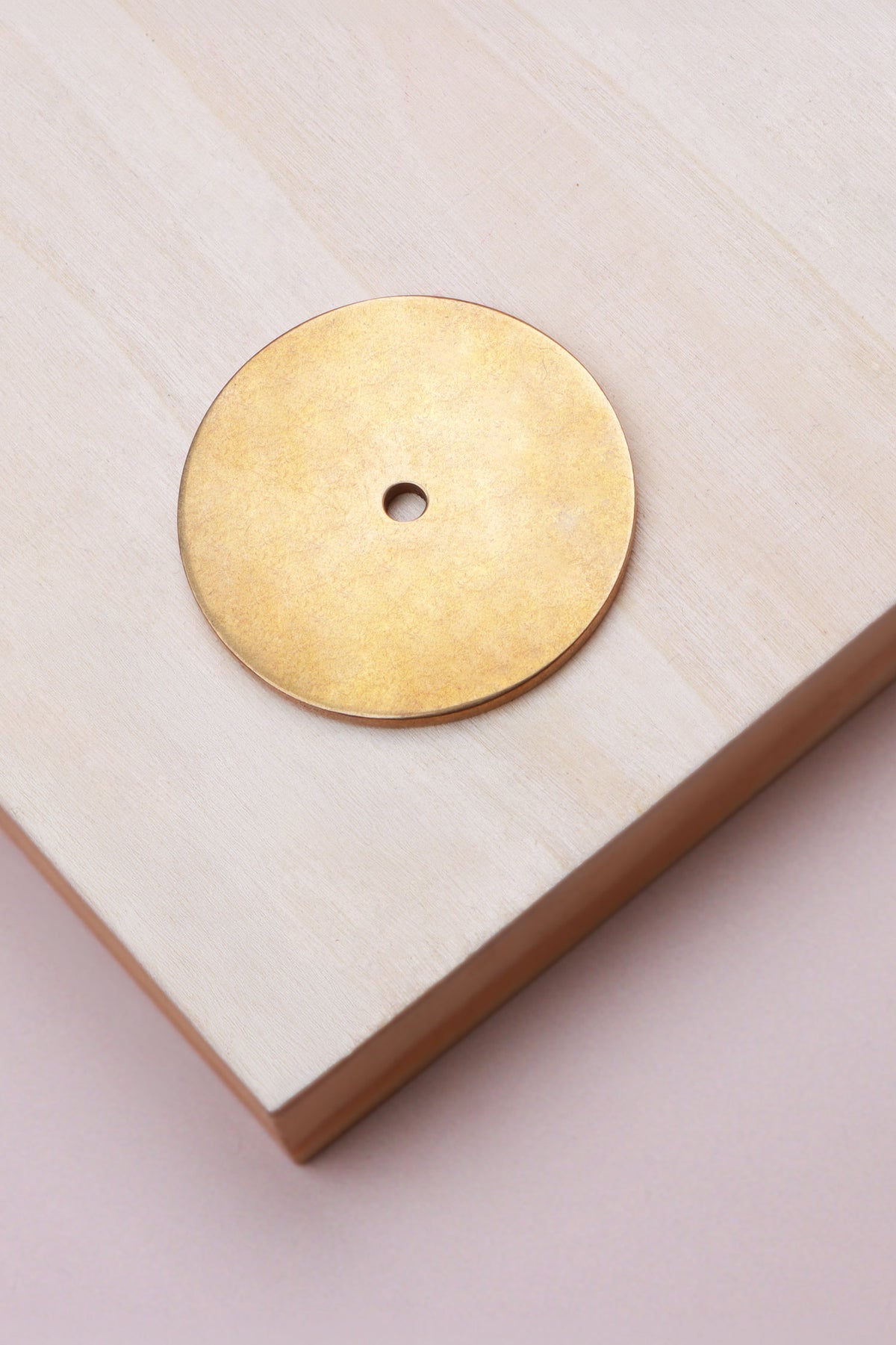Aged brass round backplate, 45mm across: solid brass with a 4mm centre hole for the knob bolt
