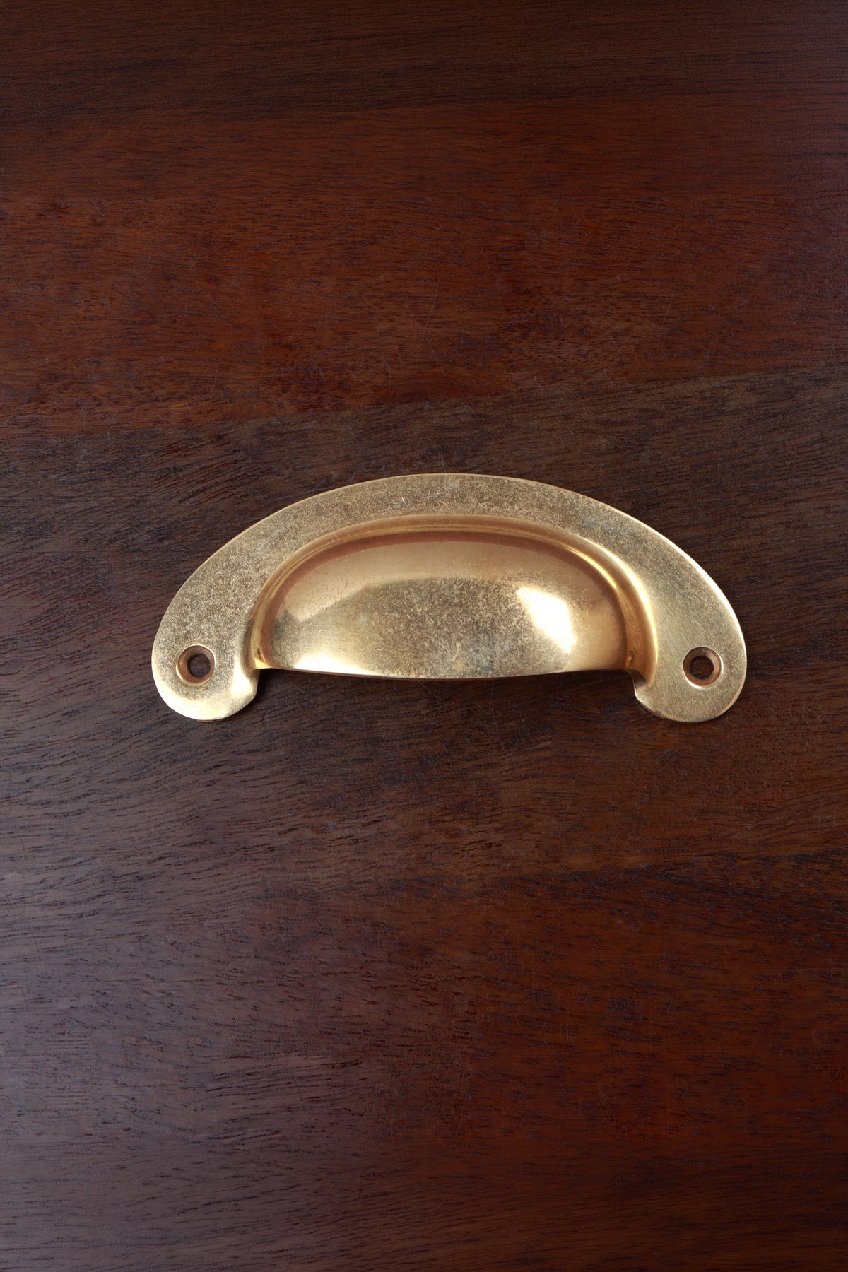 Slim crescent aged brass cup pull, 4 inch