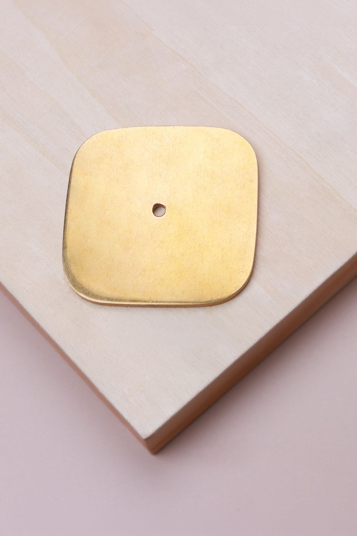 Aged brass squircle backplate, 60 x 60mm with softly rounded sides: solid brass with a 4mm centre hole for the knob bolt