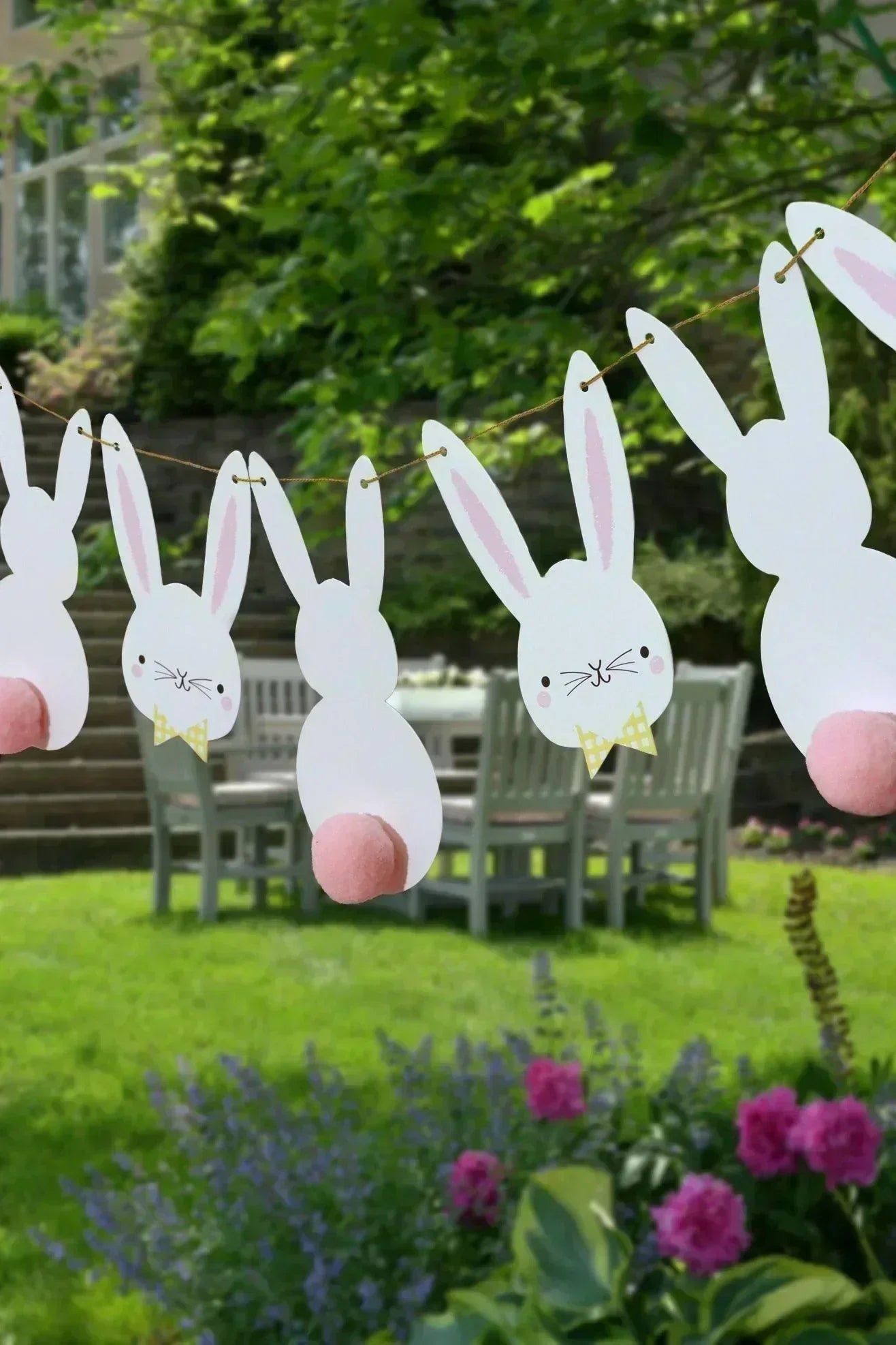 Bunny Bunting with White Rabbit Faces and Pom-Pom Tails — close-up view, G Decor