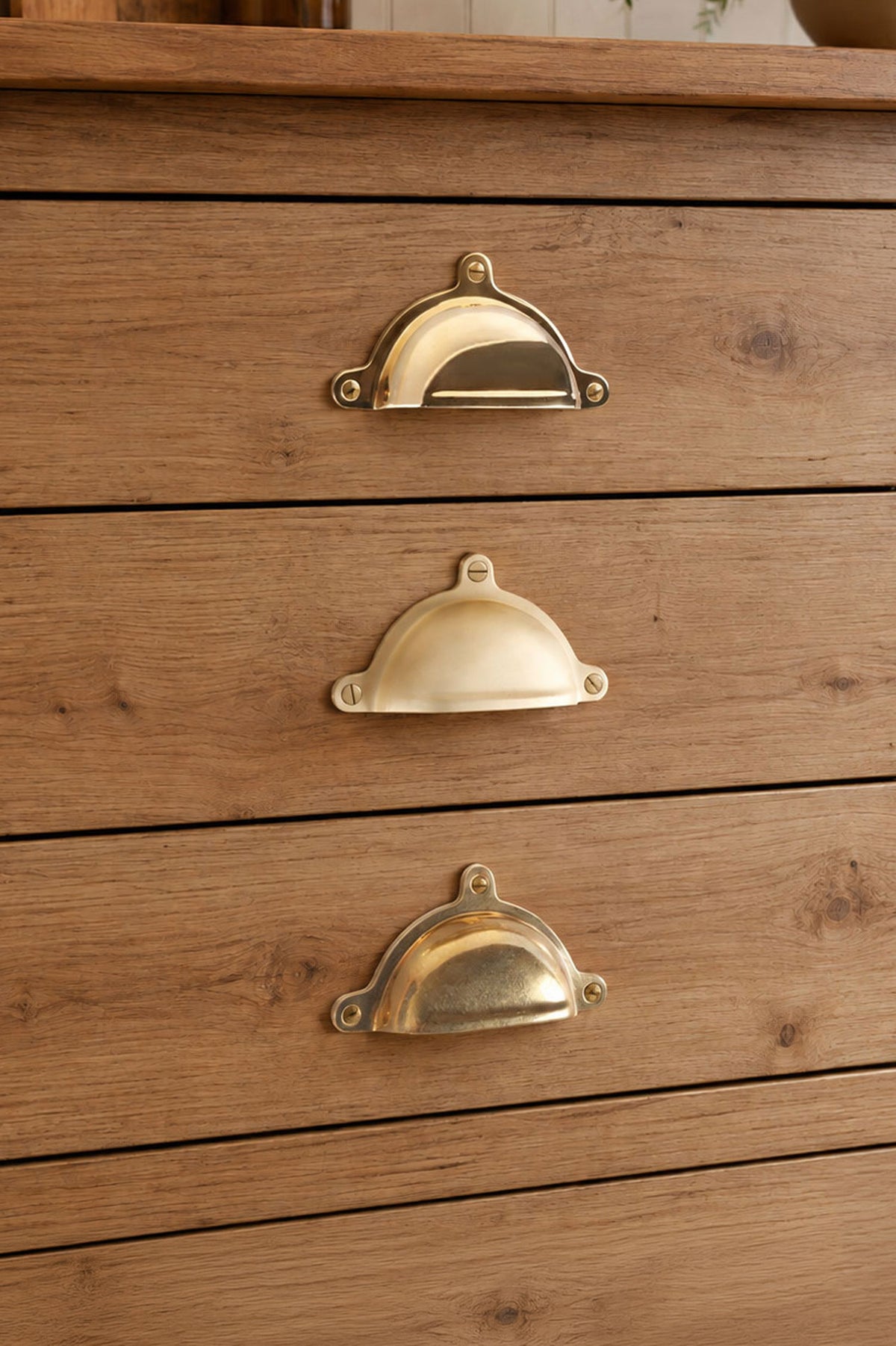 Classic cup pull in polished, aged and satin brass, second view