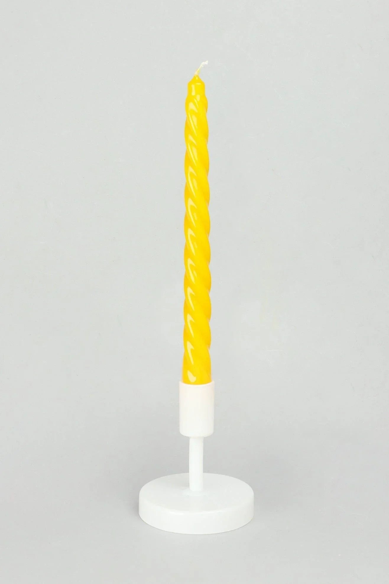 Coraline Solaira Golden Yellow Twisted Taper Candles — close-up view, G Decor