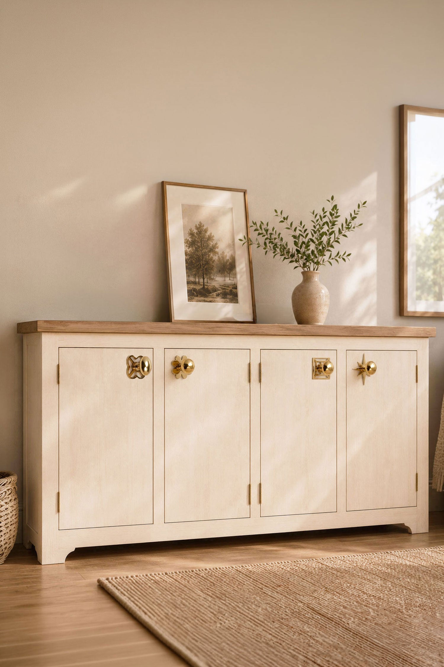 Solid brass backplates with knobs fitted to a painted sideboard