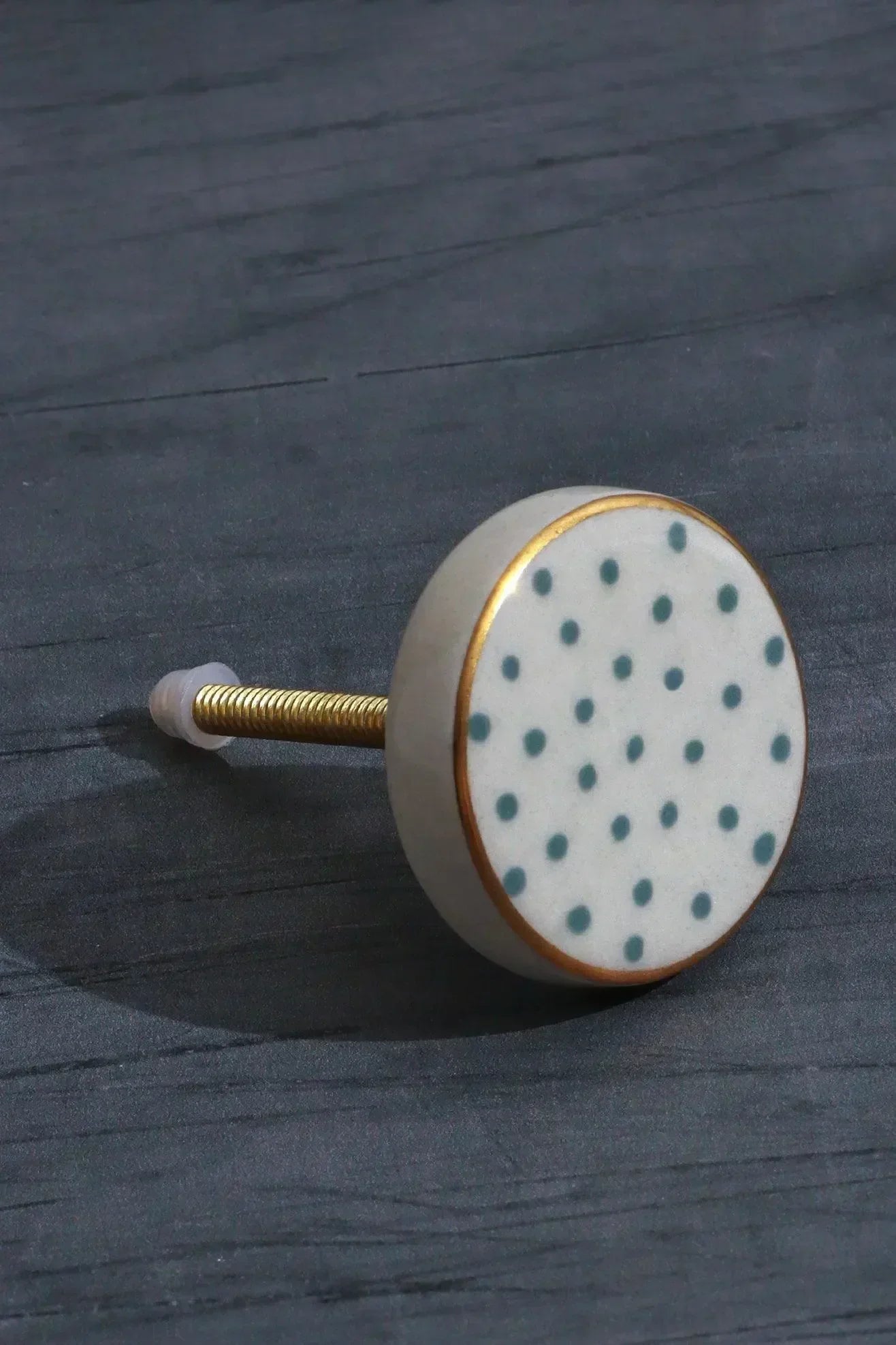 Geometric and polka-dot ceramic knobs styled together — hand-painted, G Decor