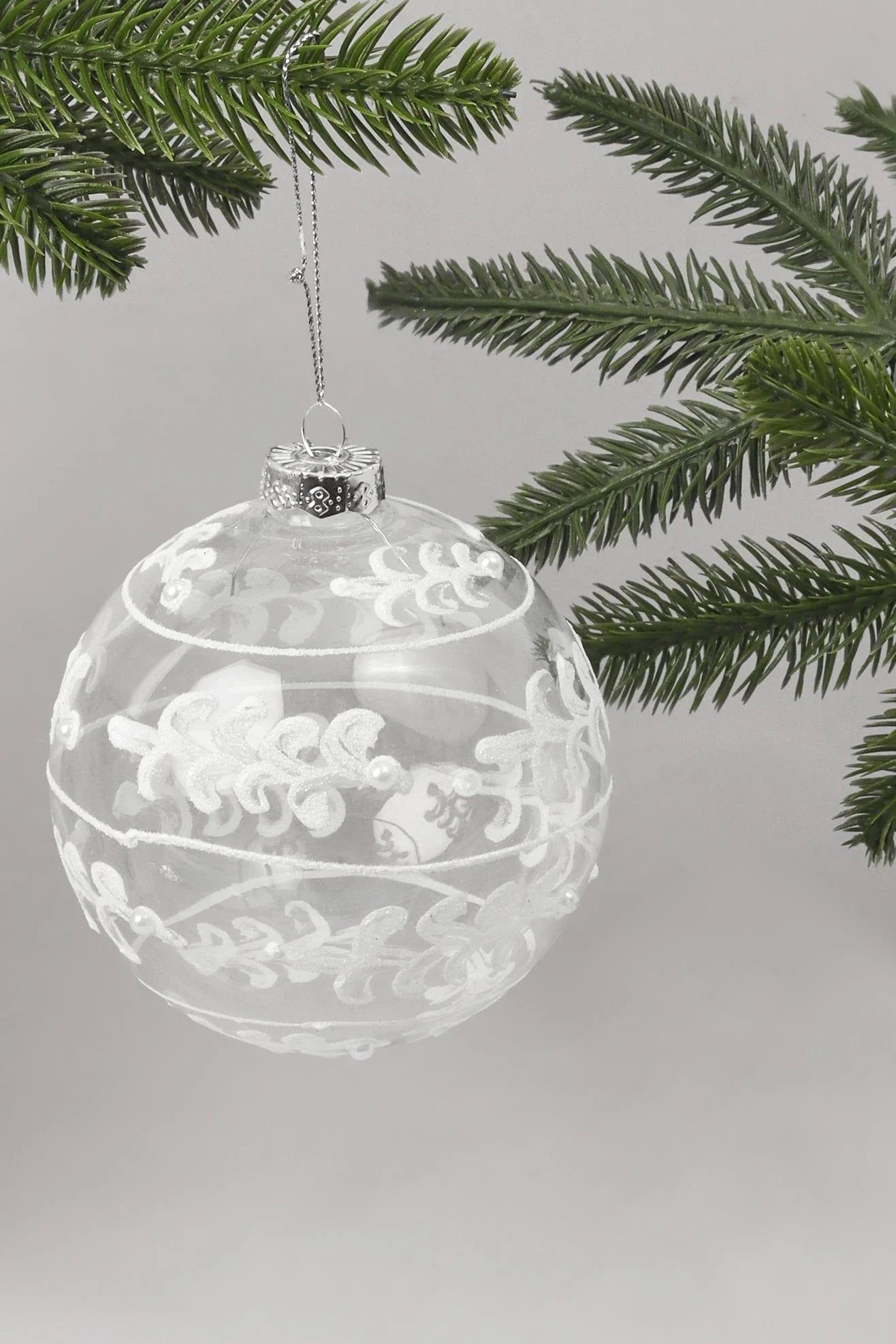 glass-christmas-tree-bauble-with-white-and-silver-glitter-patterning-g-decor-27634 - G Decor
