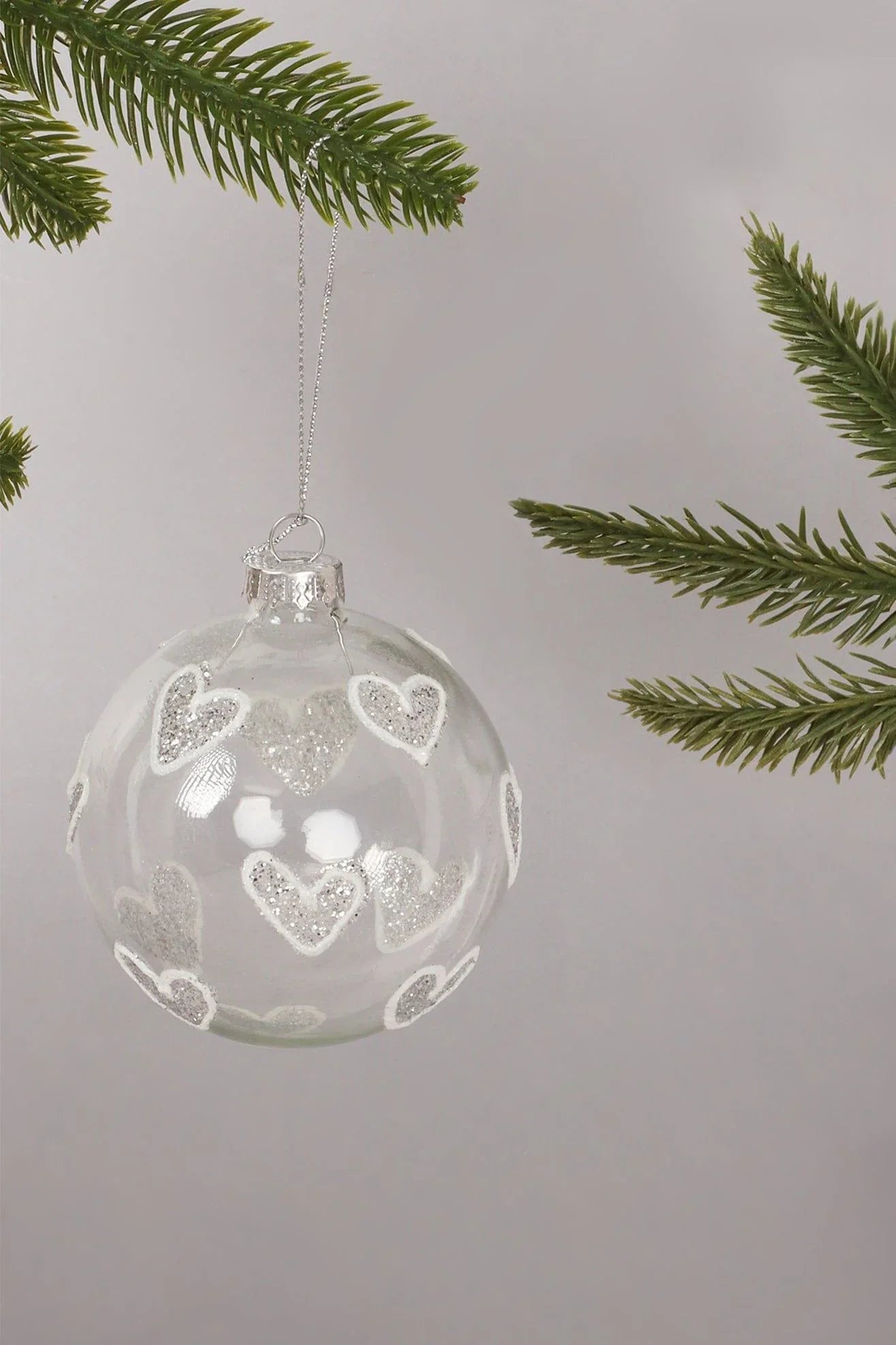 Hand-Blown Clear Glass Christmas Bauble with Silver Glitter Hearts — alternate view, G Decor