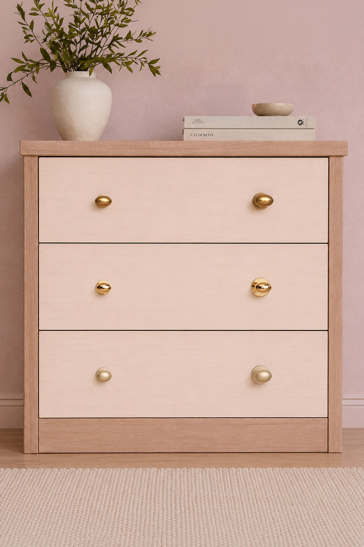 Oval cabinet knob on rose in polished, aged and satin brass, second view