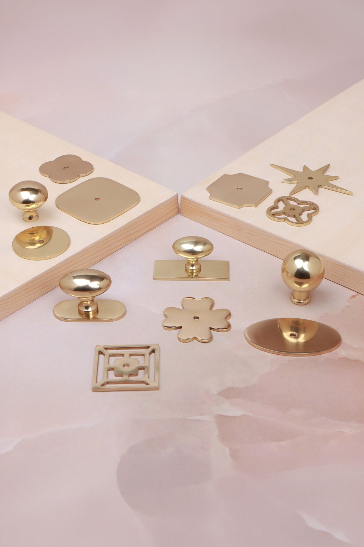 Cabinet knobs and backplates in polished brass, third view