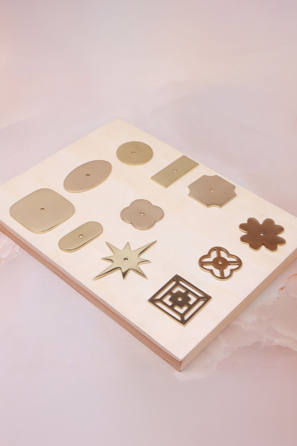 Solid brass knob backplates in polished brass