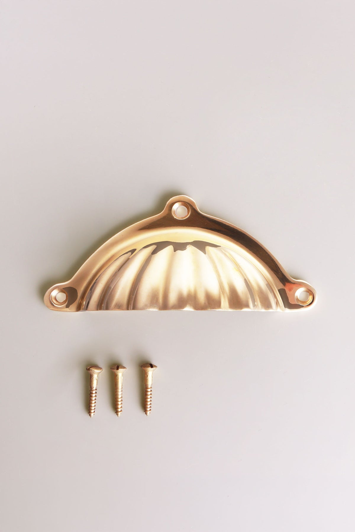 Scalloped cup pull in polished brass