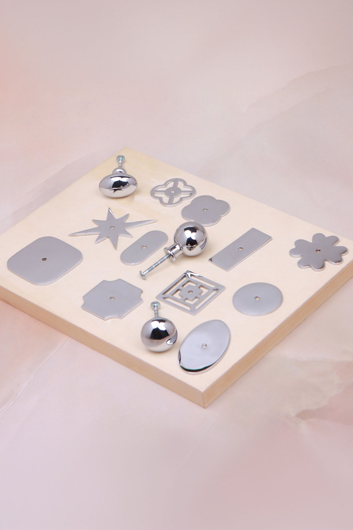 Cabinet knobs and backplates in polished chrome, fourth view
