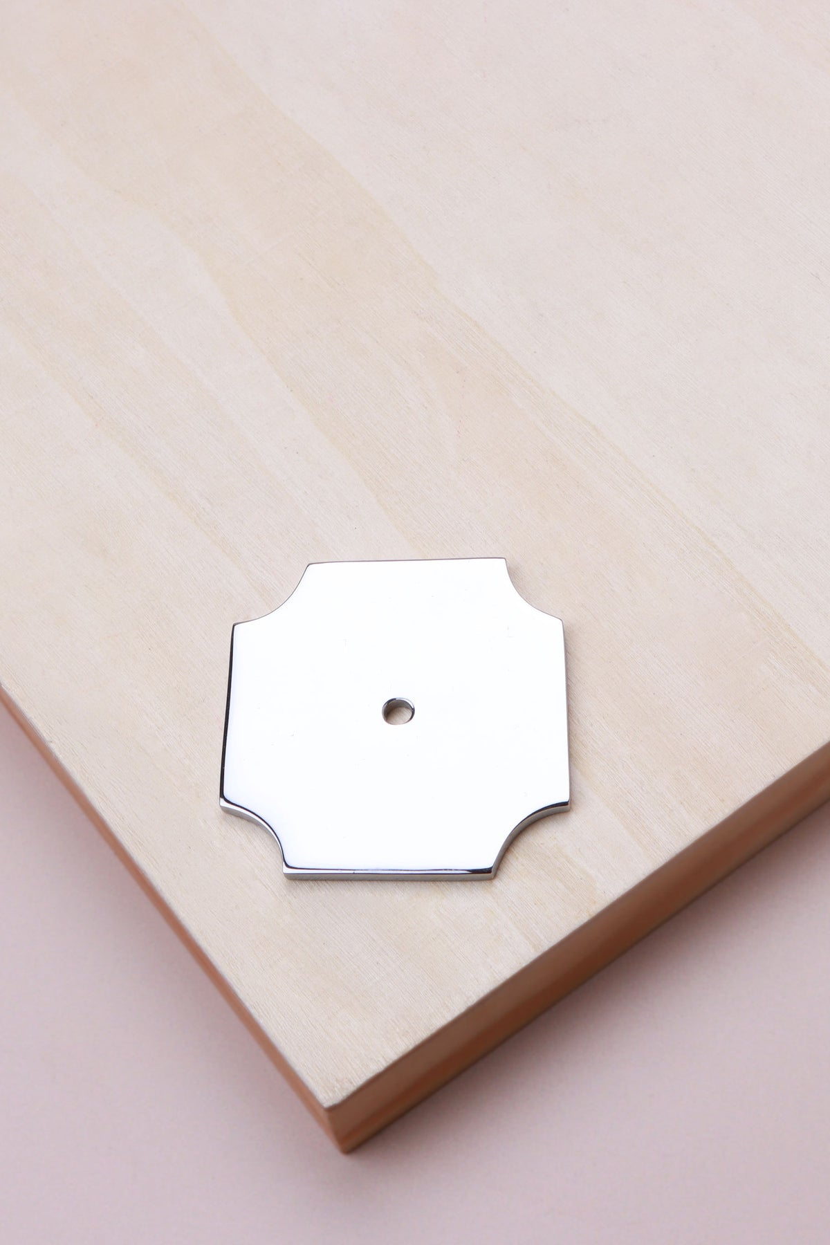 Polished chrome square backplate, 50 x 50mm with scooped corners: chrome-plated solid brass with a 4mm centre hole for the knob bolt