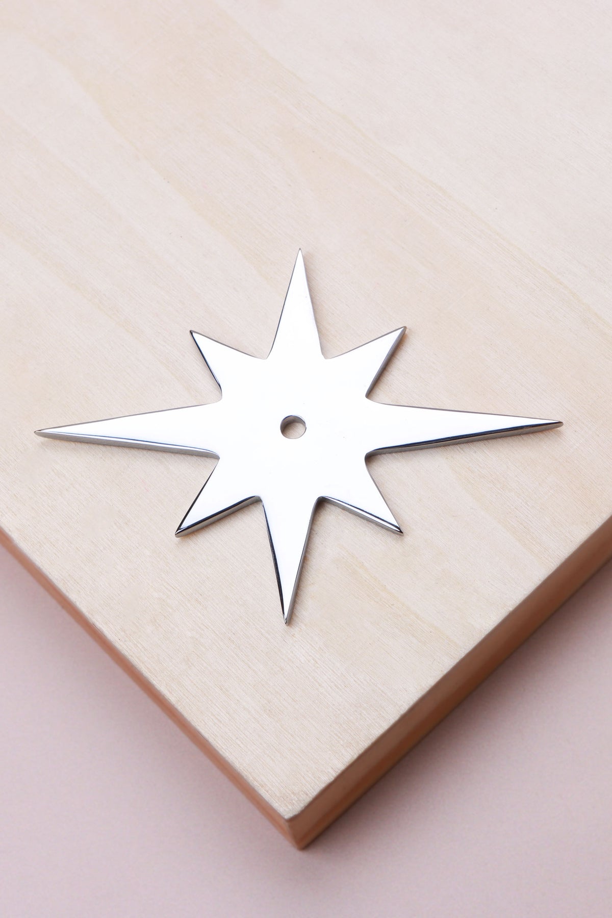 Polished chrome star backplate, 87 x 68mm: chrome-plated solid brass with a 4mm centre hole for the knob bolt
