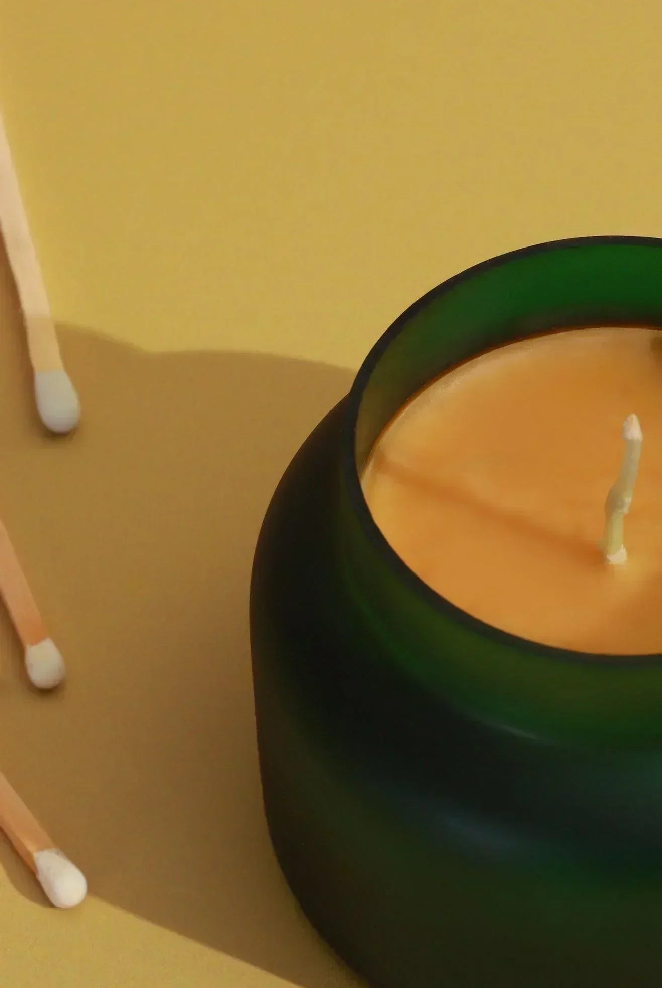 Rasa Aranya Patchouli & Sweet Citrus Scented Candle in Frosted Green Glass - G Decor