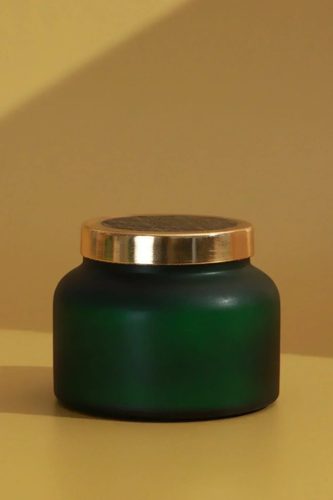 Rasa Aranya Patchouli and Citrus Scented Candle — close-up view, G Decor