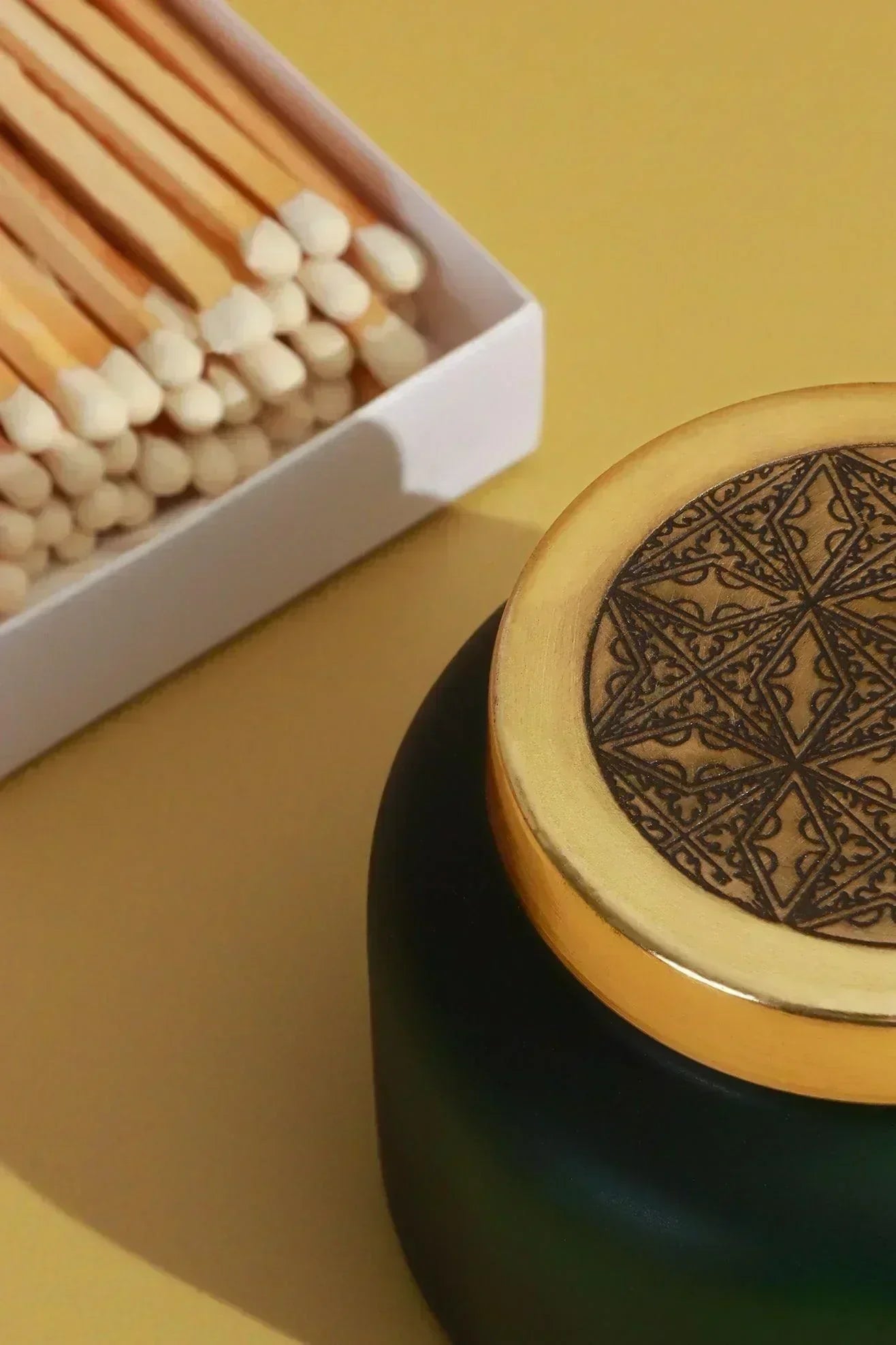 Rasa Aranya Patchouli and Citrus Scented Candle — lifestyle view, G Decor