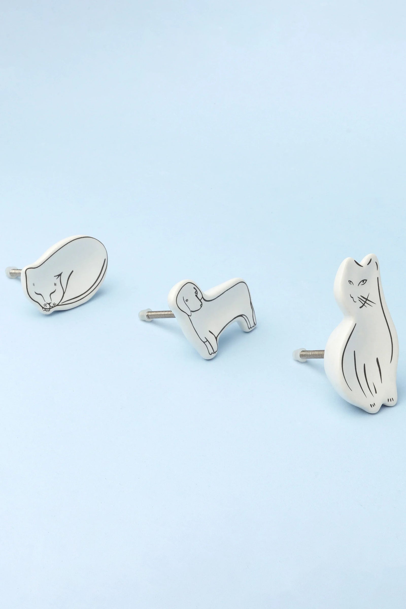Sleepy Cat and Loyal Pup Furry Friends Ceramic Cabinet Knob — close-up view, G Decor